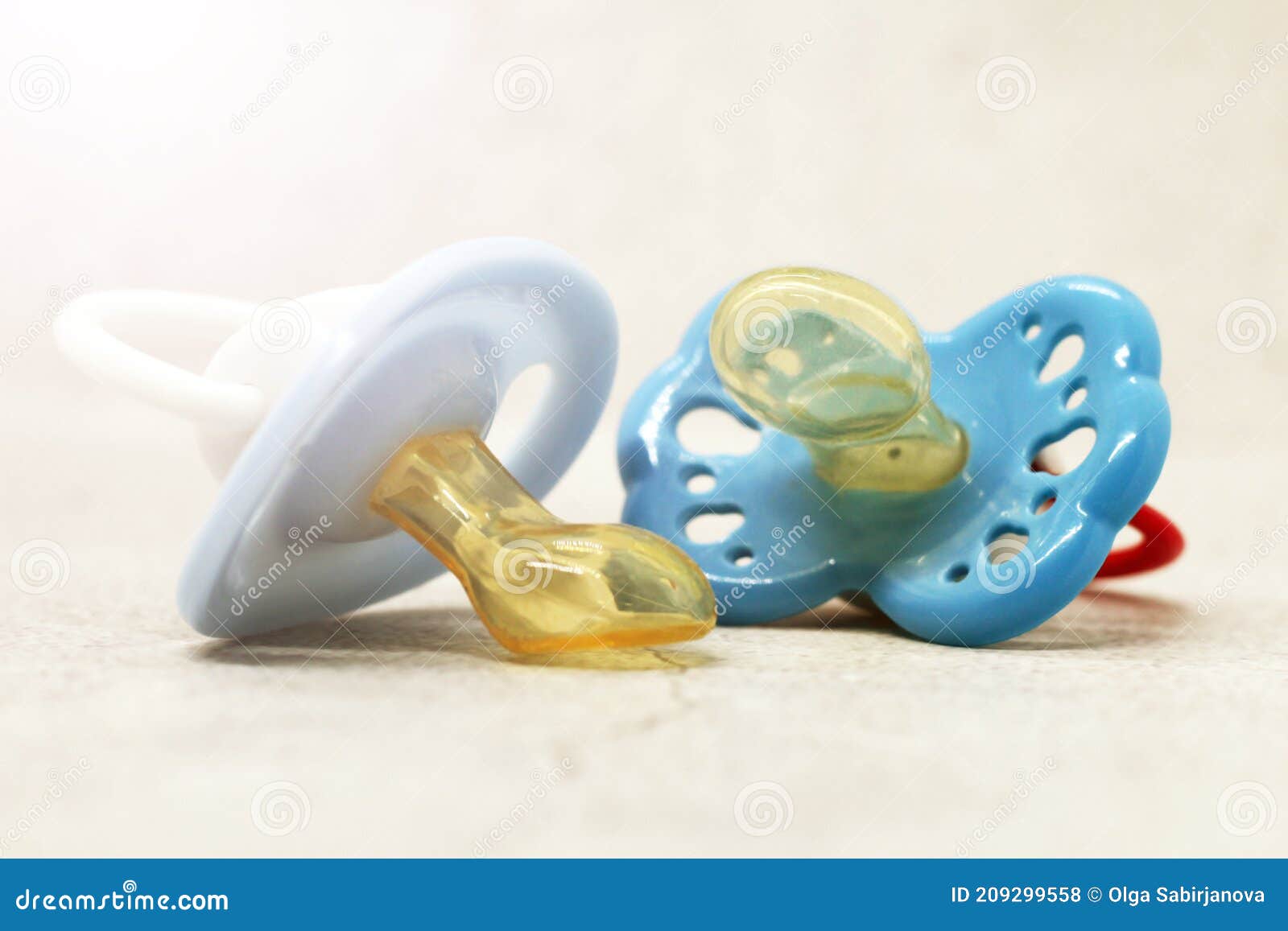 Two Blue baby pacifiers stock photo. Image of equipment - 209299558