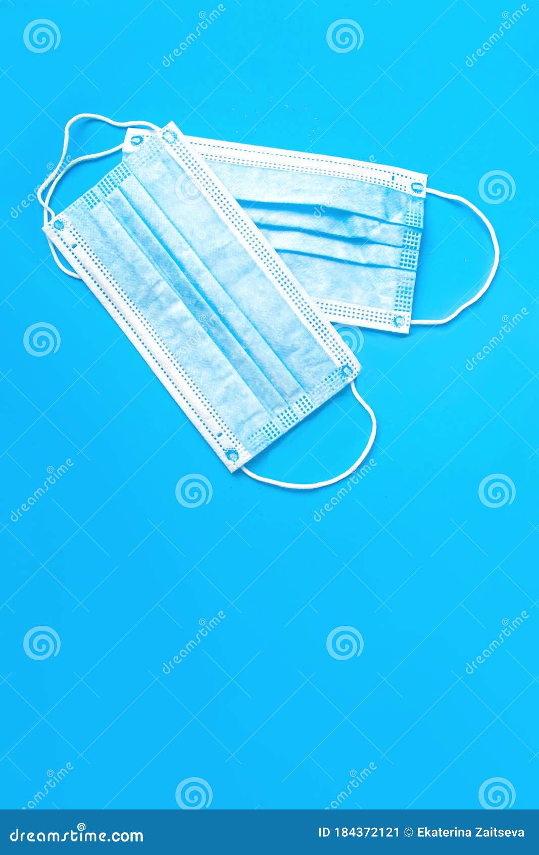 Two Blue Medical Face Masks on Blue Backround Stock Image Image of