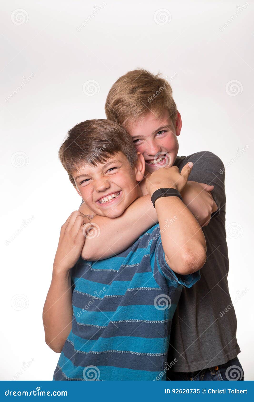 young boys hugging