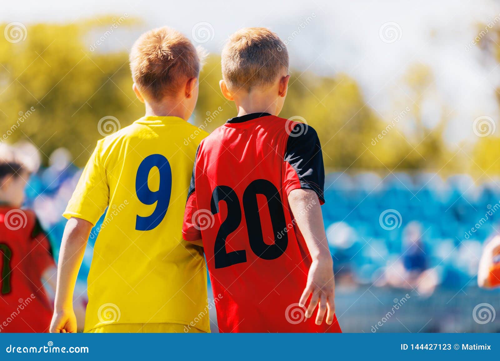 Two Boys Soccer Players In Colourful 