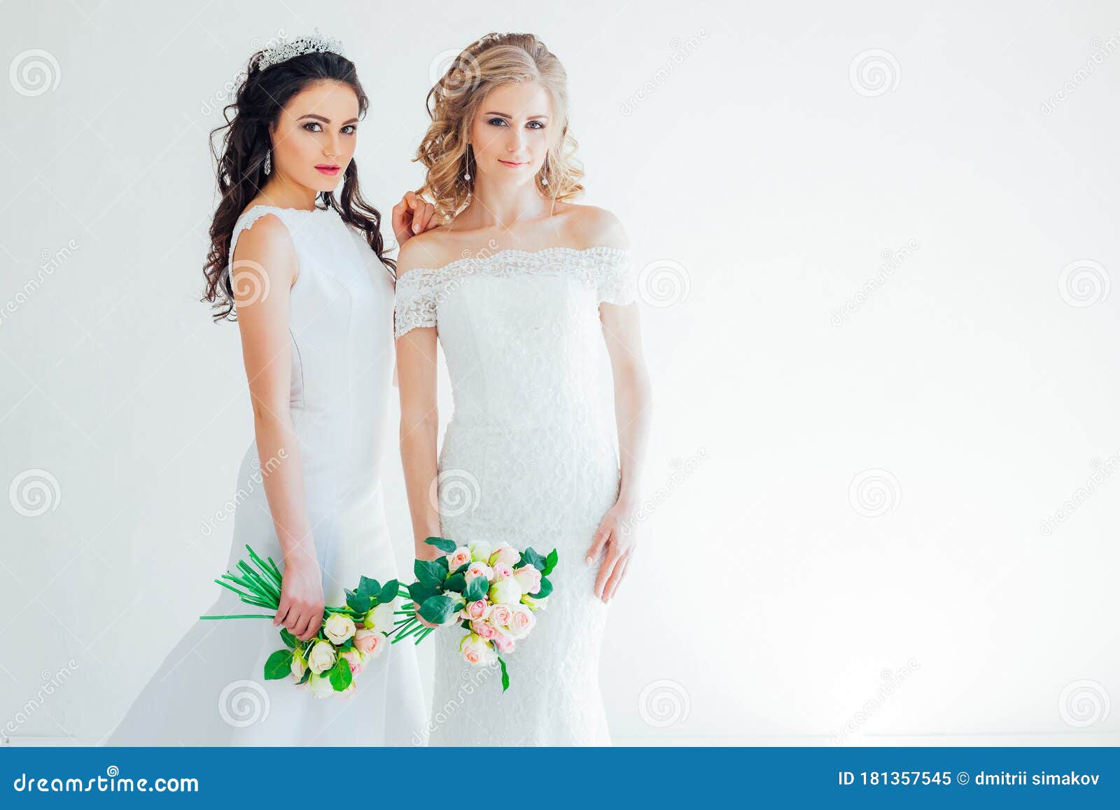 Two Brides in White Wedding Gowns Flowers Stock Image Image of