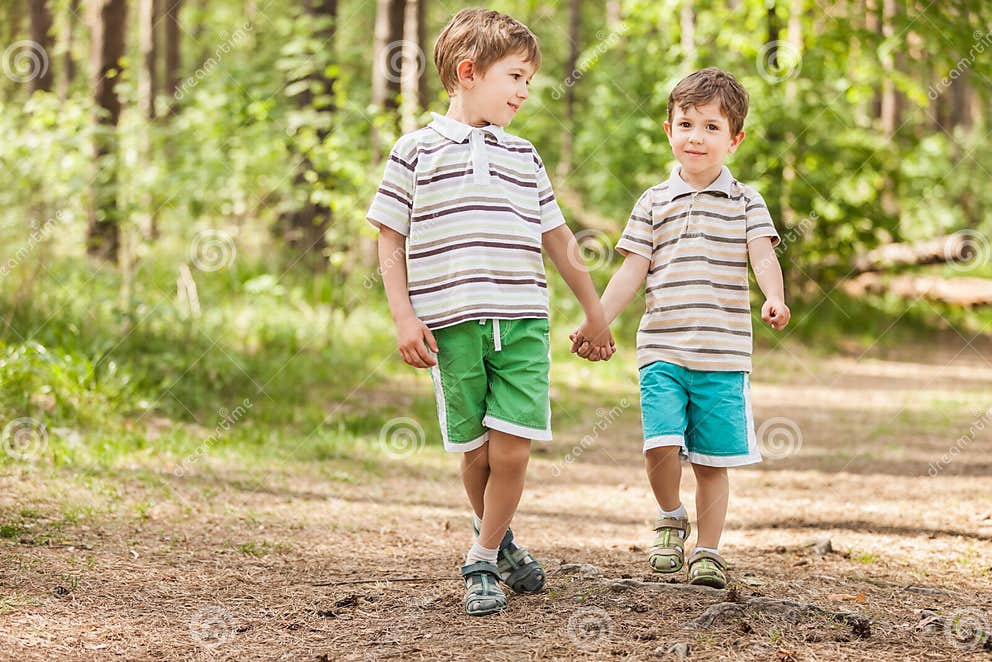 Two brothers stock photo. Image of happiness, holding - 24973900