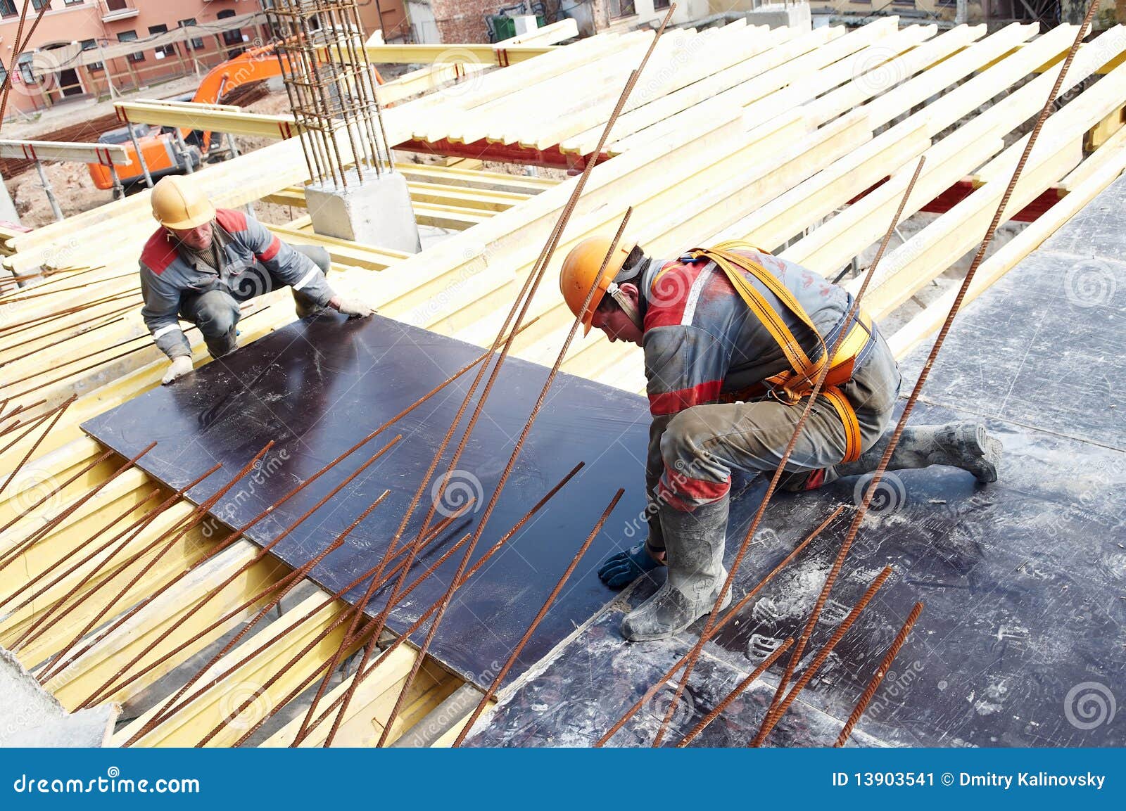 Two builders at work stock image. Image of worker, installer - 13903541