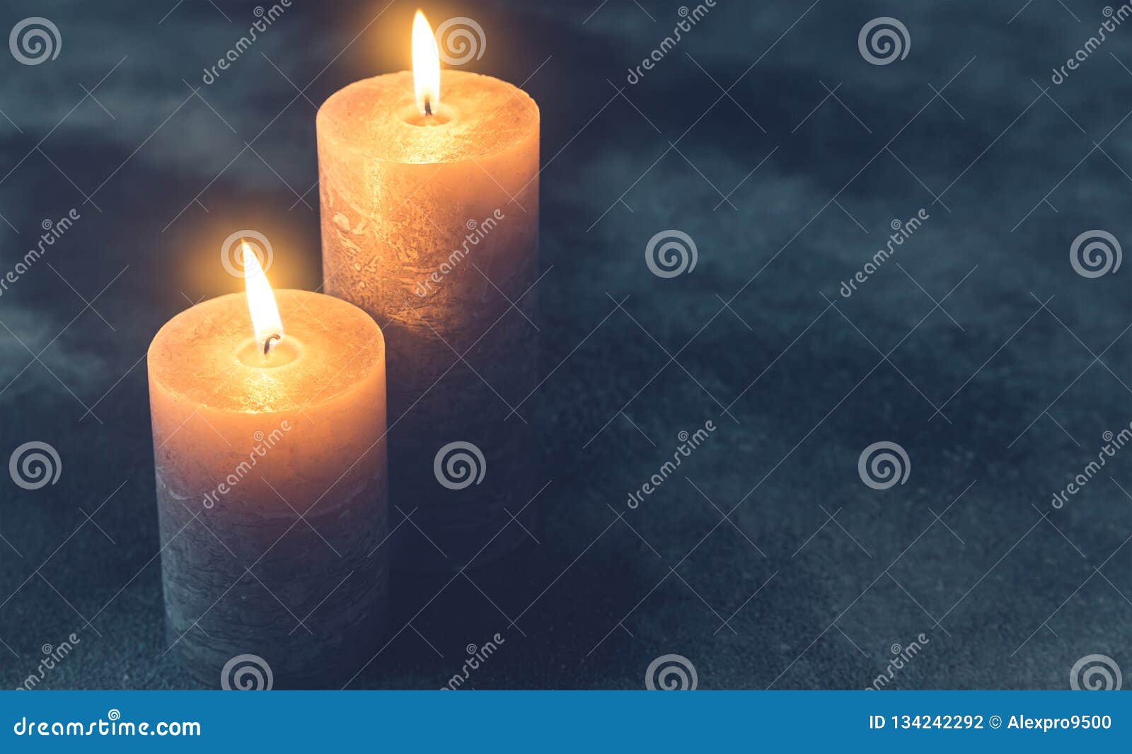 Two Burning Candles on Navy Blue Background Stock Photo - Image of ...