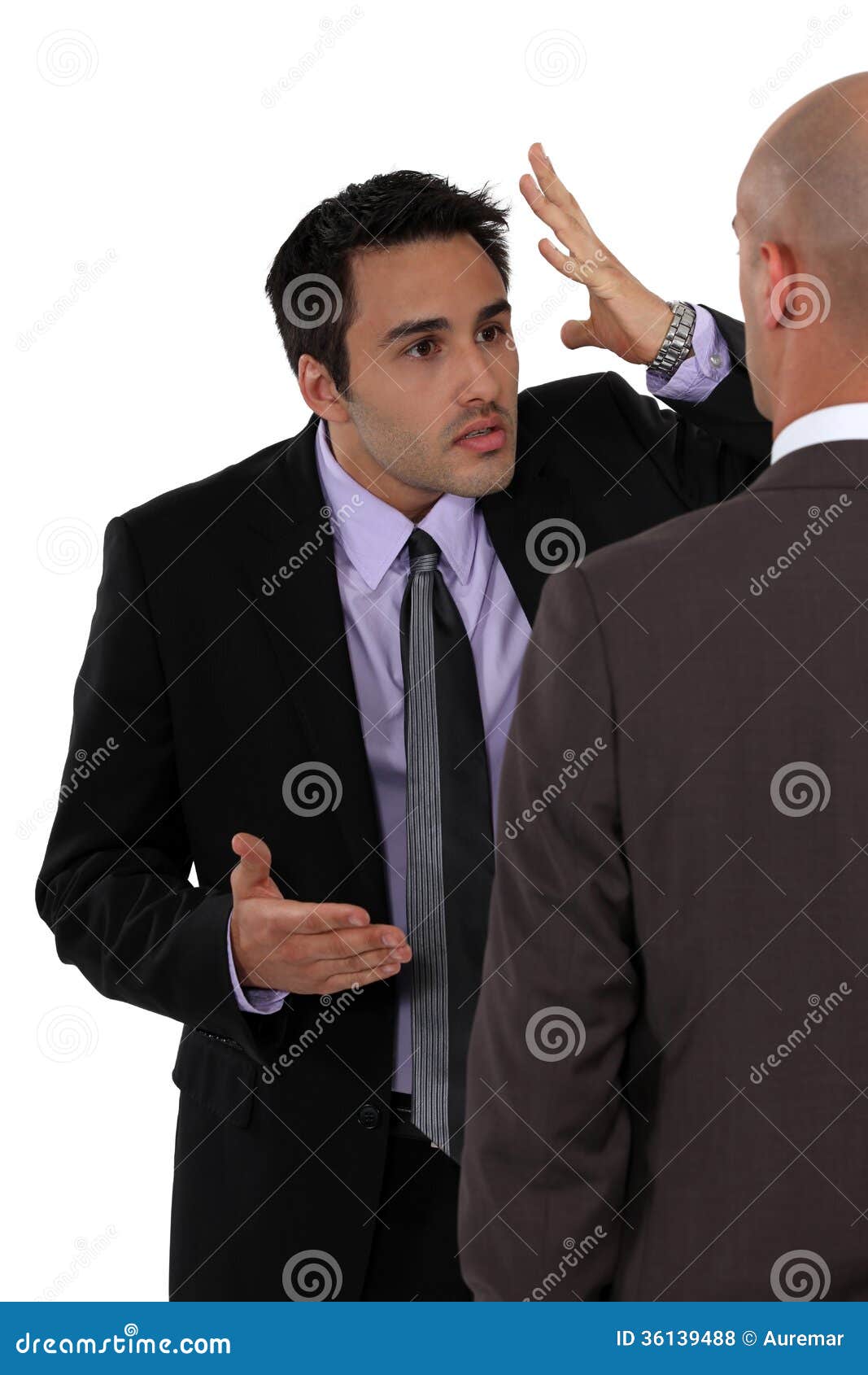 two businessmen disagreeing
