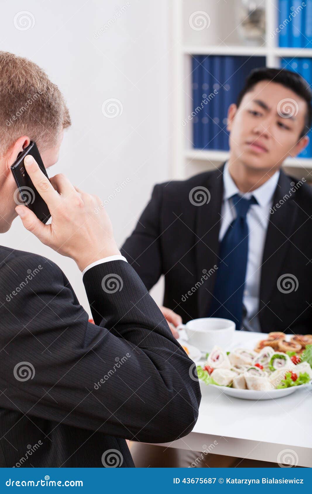 Two Businessmen Having a Lunch Time Stock Image - Image of cooperation