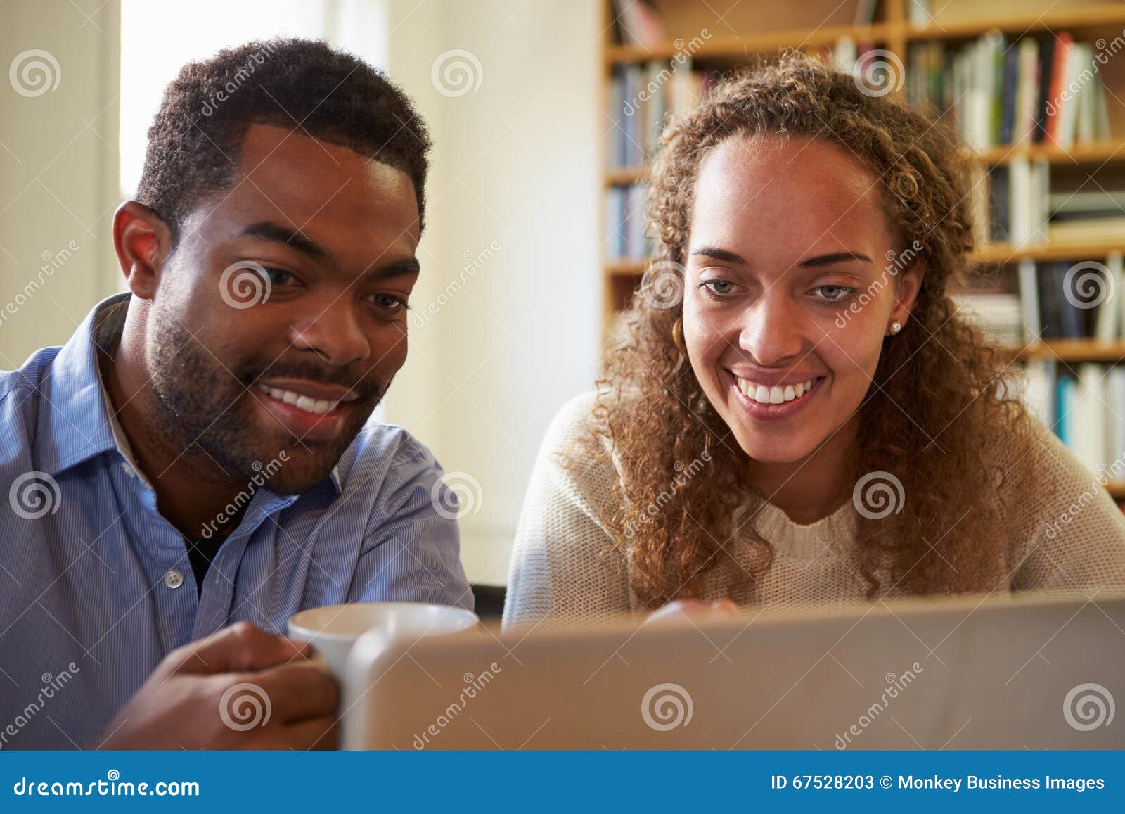 Two Businesspeople Working at Laptop in Office Stock Image Image of office, computer 67528203