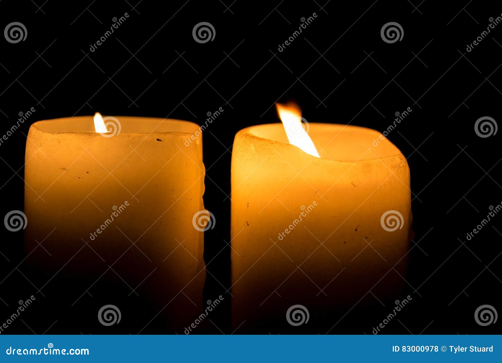 Two Candles Burning stock photo. Image of glow, flame 83000978