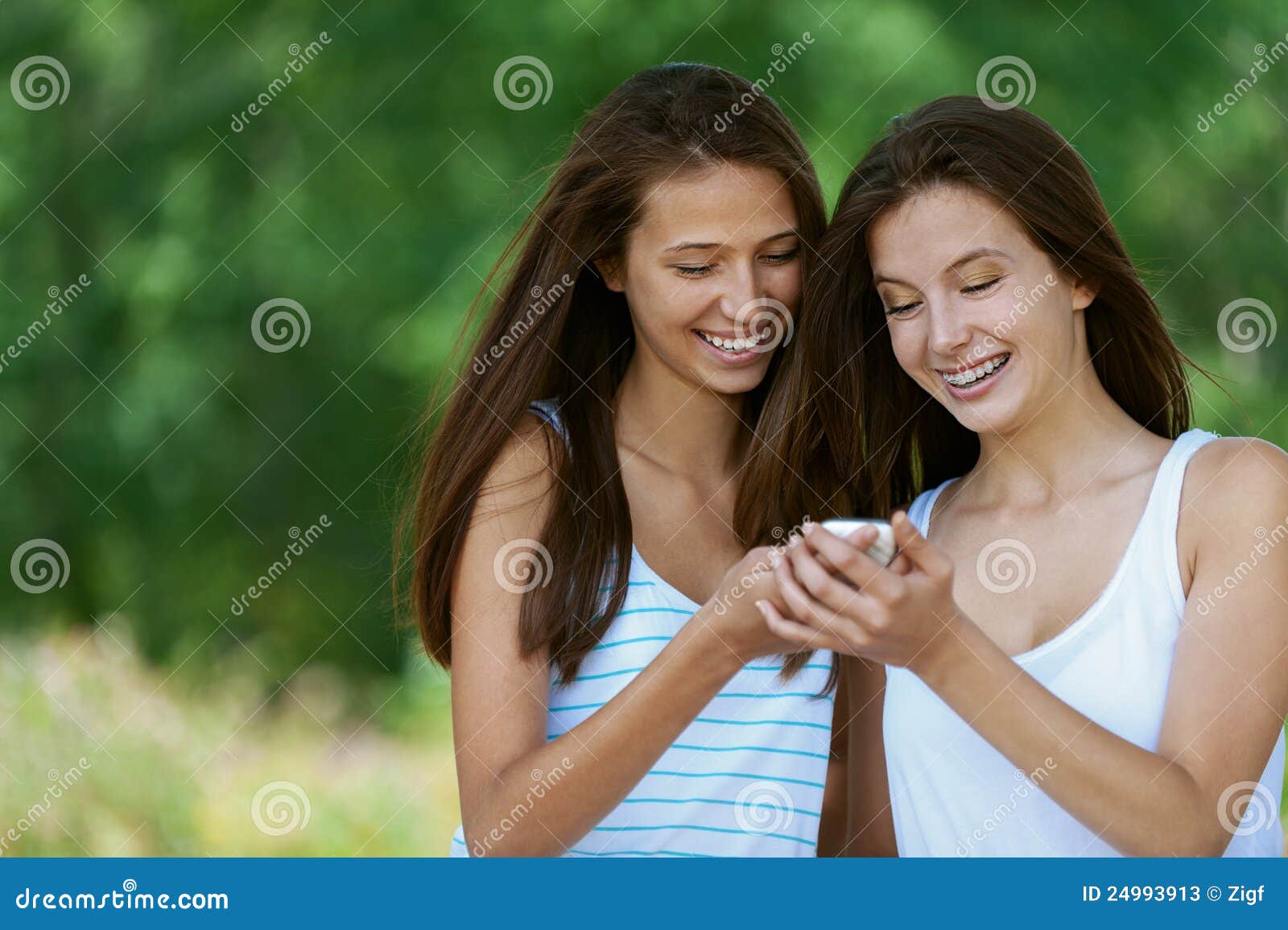 Two Charming Girls Reads Message Stock Image - Image of mobile ...