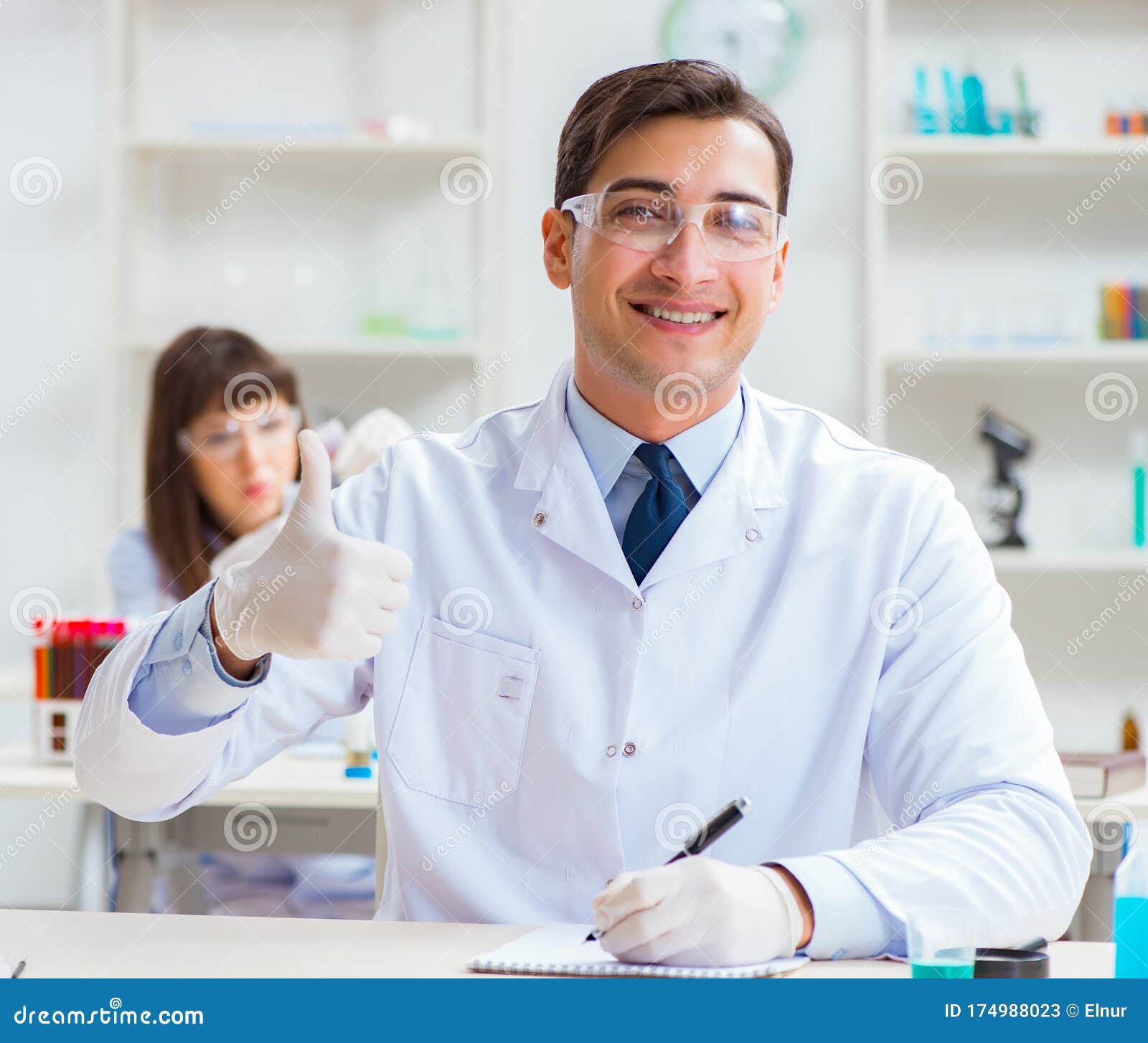Two Chemists Working in Lab Experimenting Stock Image Image of