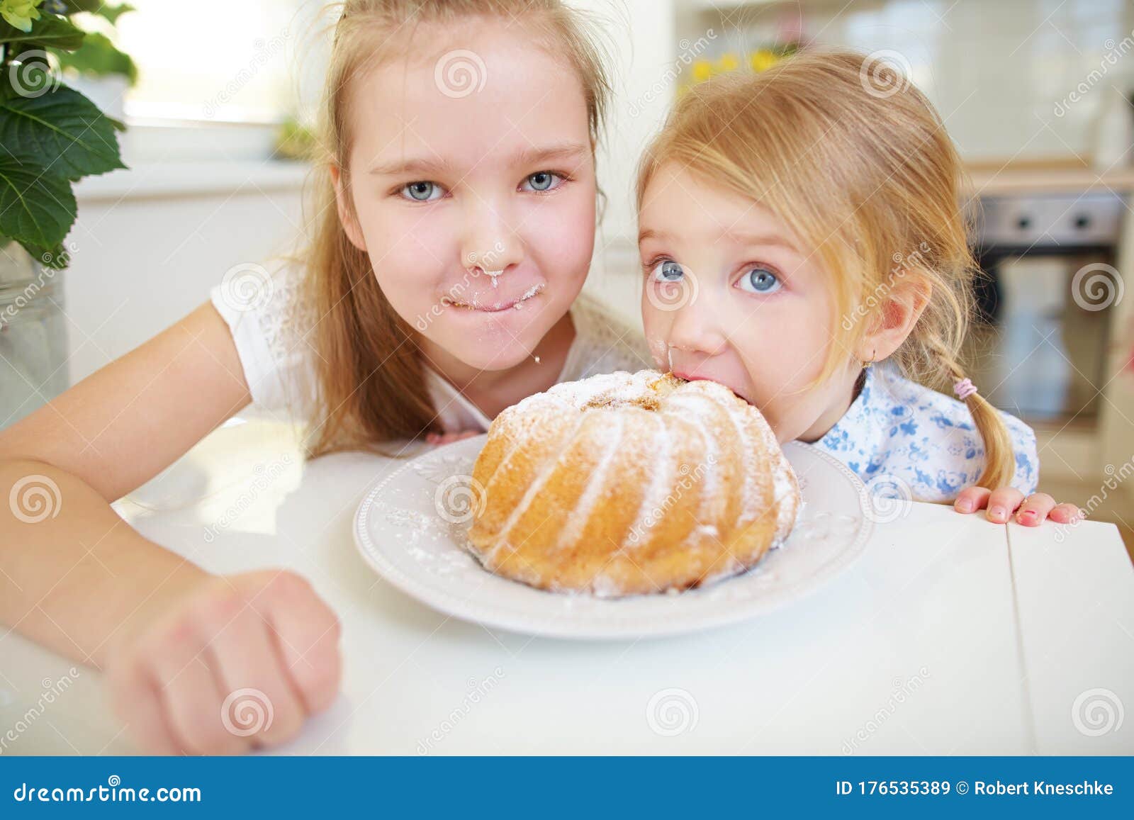 Two Children Secretly Snack on Cakes Stock Image Image of family, cake 176535389