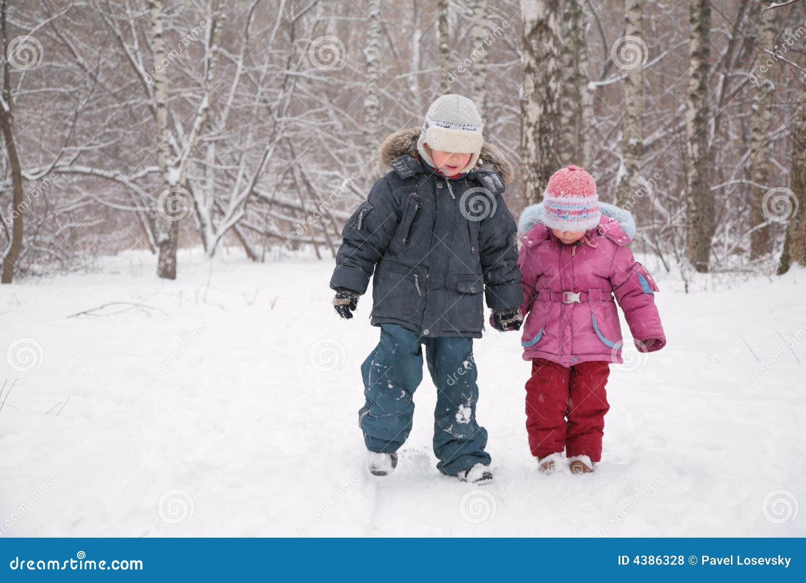 Two Children Walking in Snow Stock Photo Image of outside, body 4386328