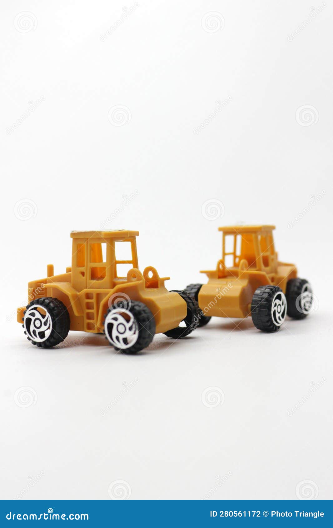 Two Clean Yellow Toy Trucks Stock Photo Image of object, craft 280561172
