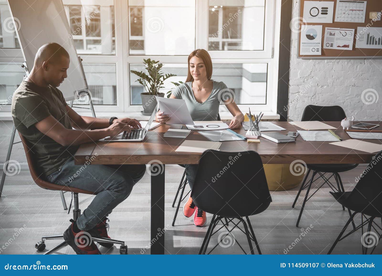 two colleagues concentrated on their working tasks
