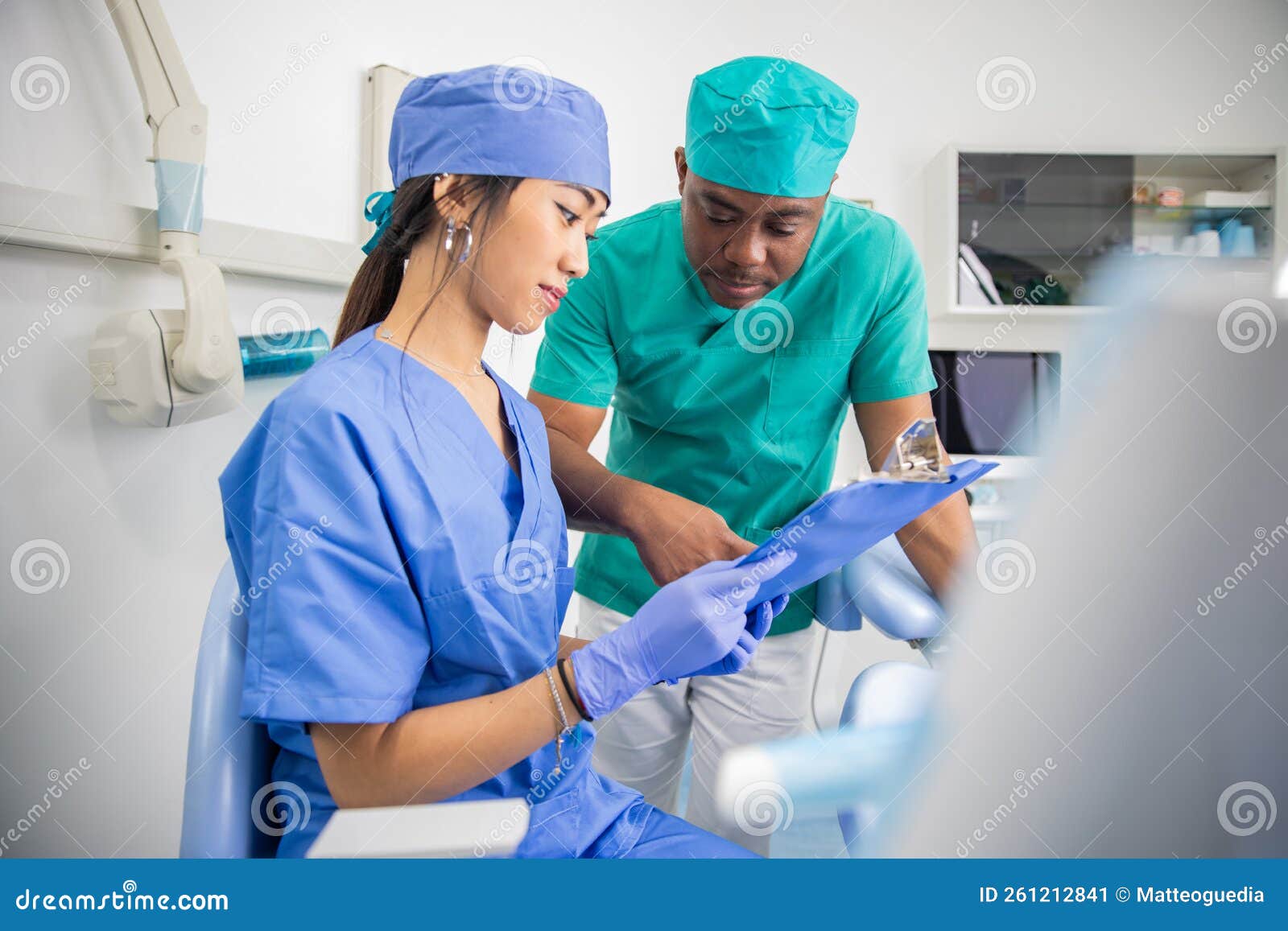 Two Colleagues Dentists in the Dental Office, Work between Doctors