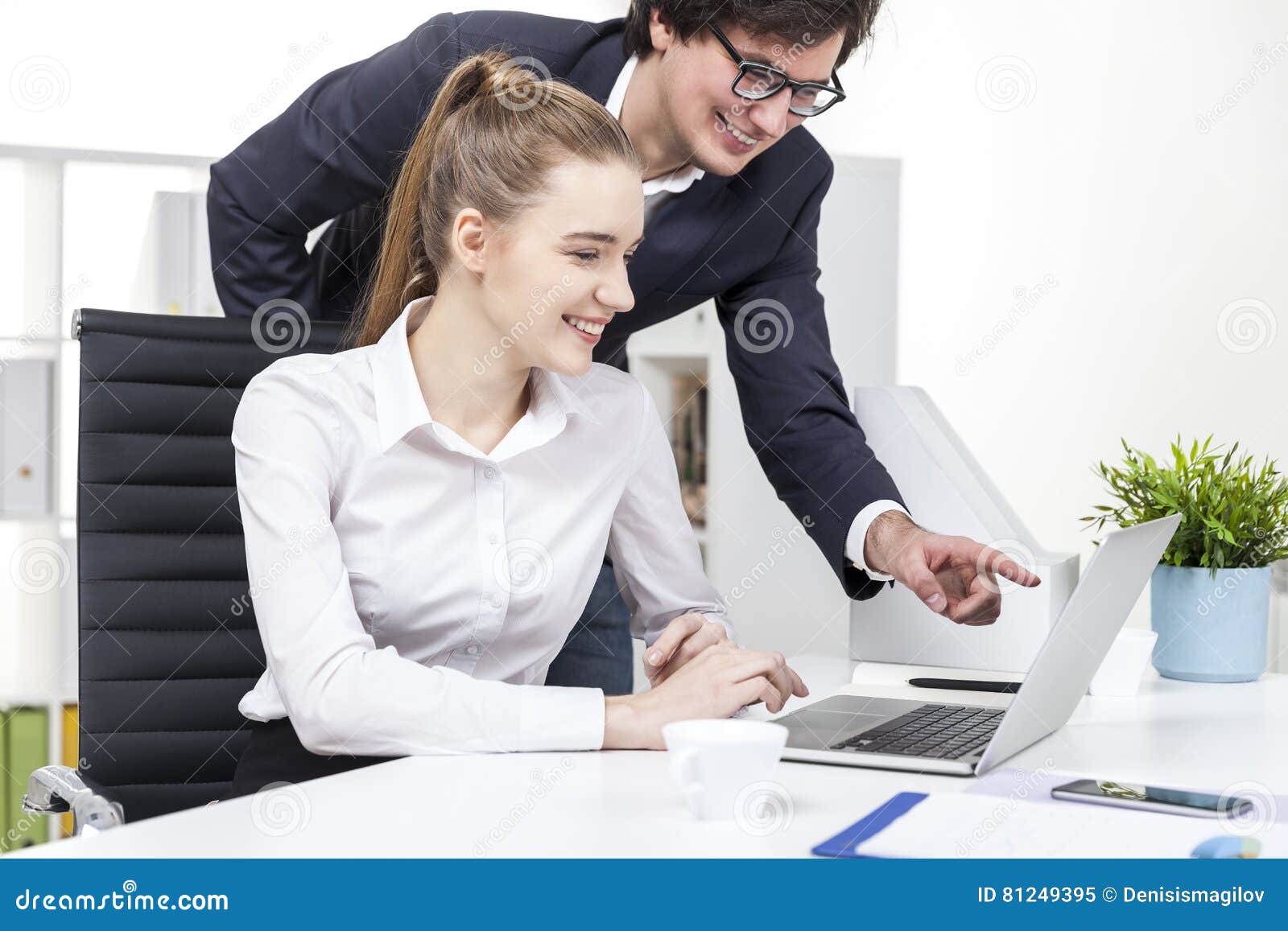 Two Coworkers Watching a Funny Video at Lunch Break Stock Image - Image of  portrait, sitting: 81249395