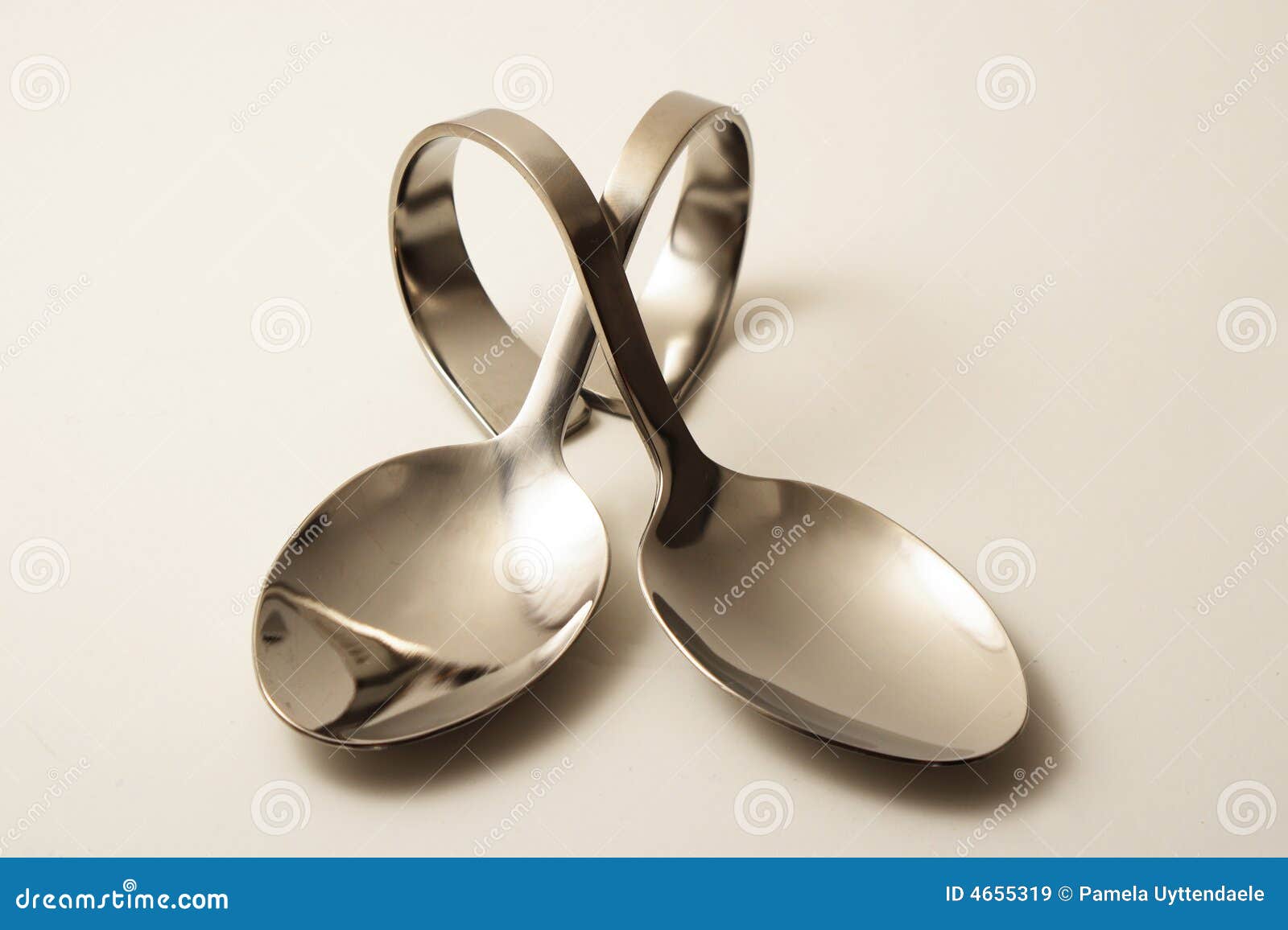 two crossed party spoons