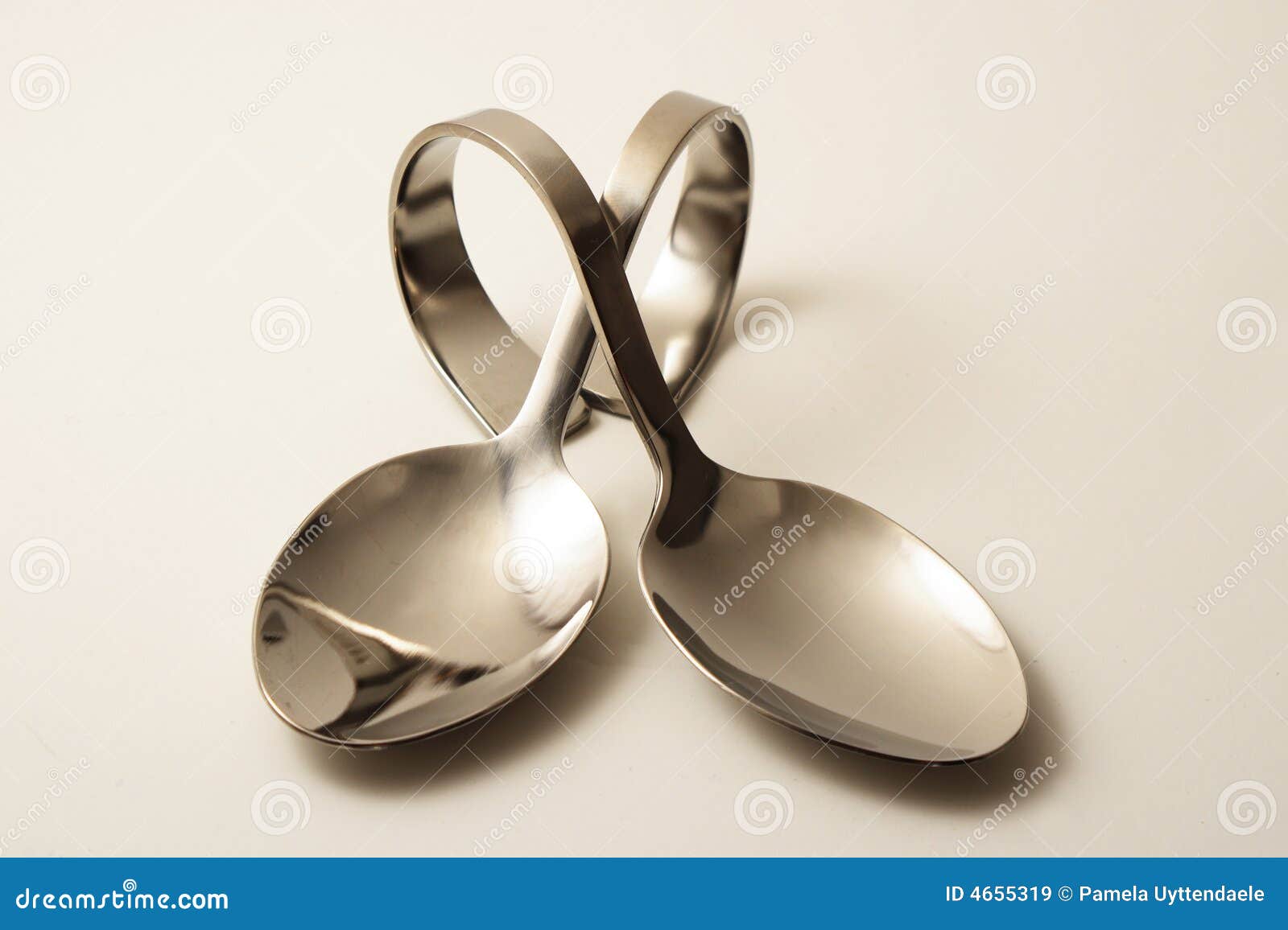 Two crossed party spoons stock image. Image of bouche 4655319