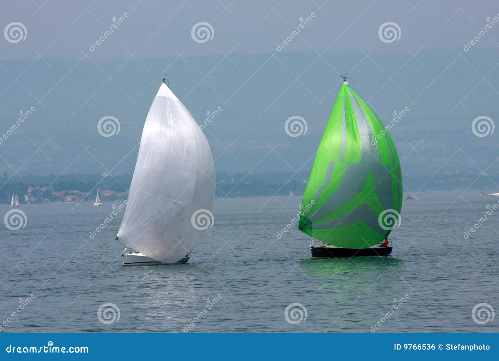 two cruising sailboats