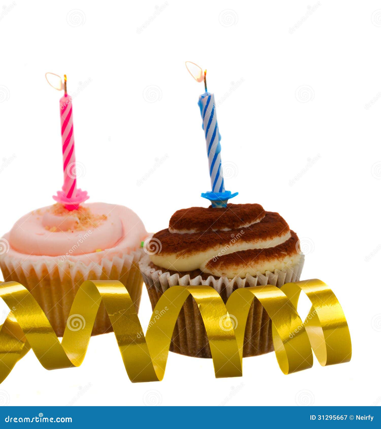 Two cupcakes with candles stock image. Image of burning 31295667