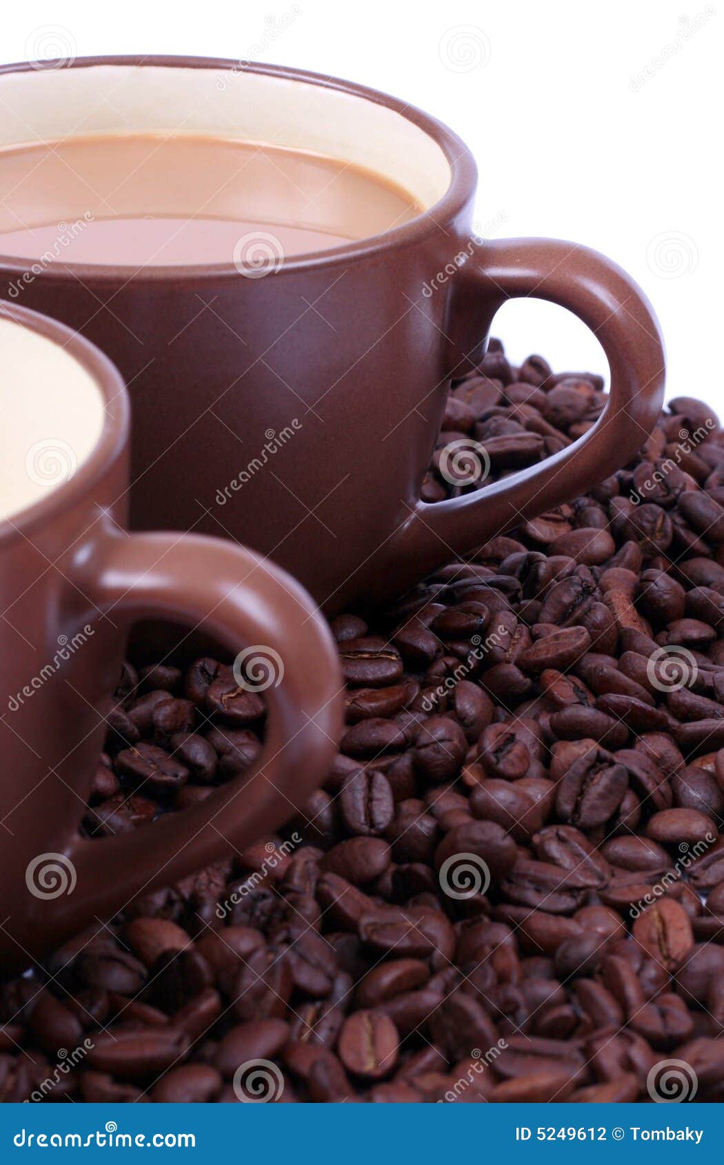Two cups and coffee beans stock photo. Image of cafe, milk 5249612