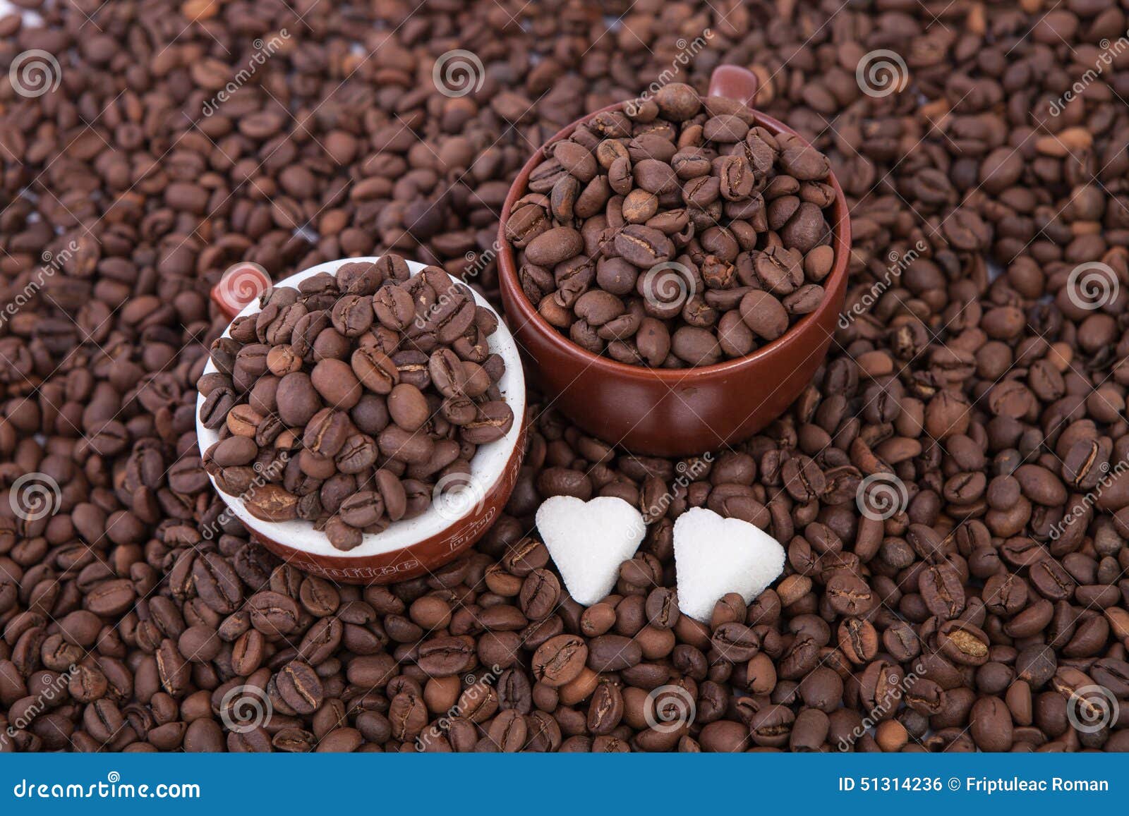 Two Cups of Coffee Full of Coffee Beans. Closeup Stock Photo Image