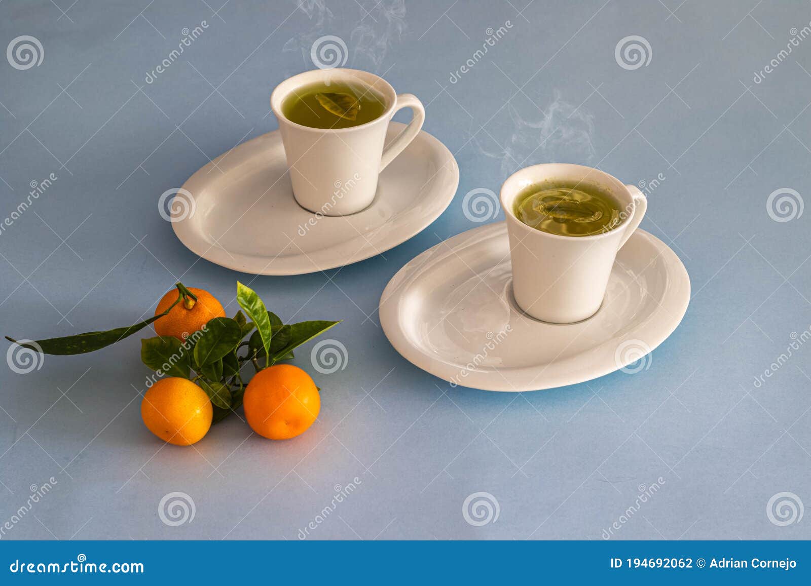 two cups of hot tangerine tea