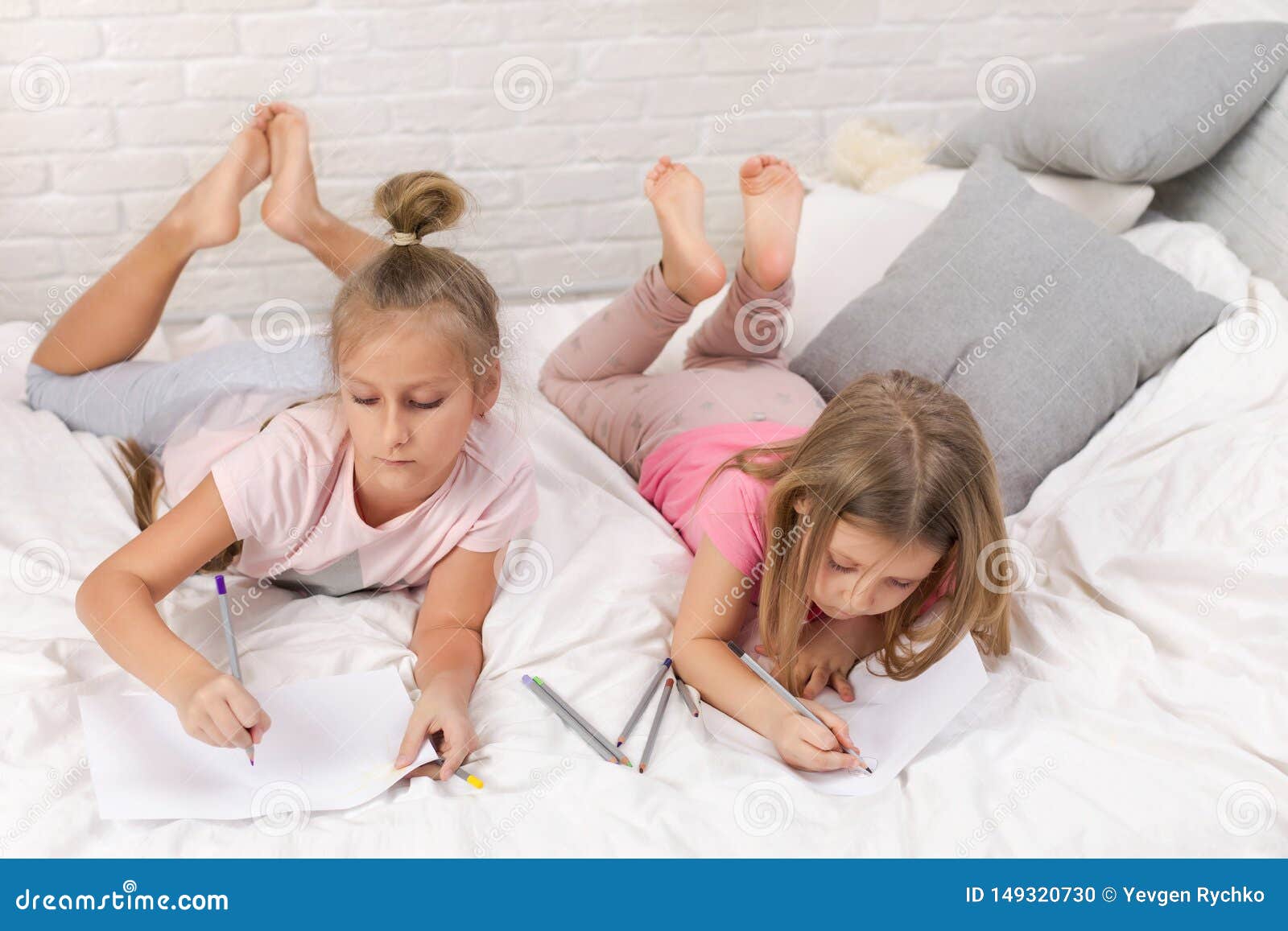 Girls Playing In Bed
