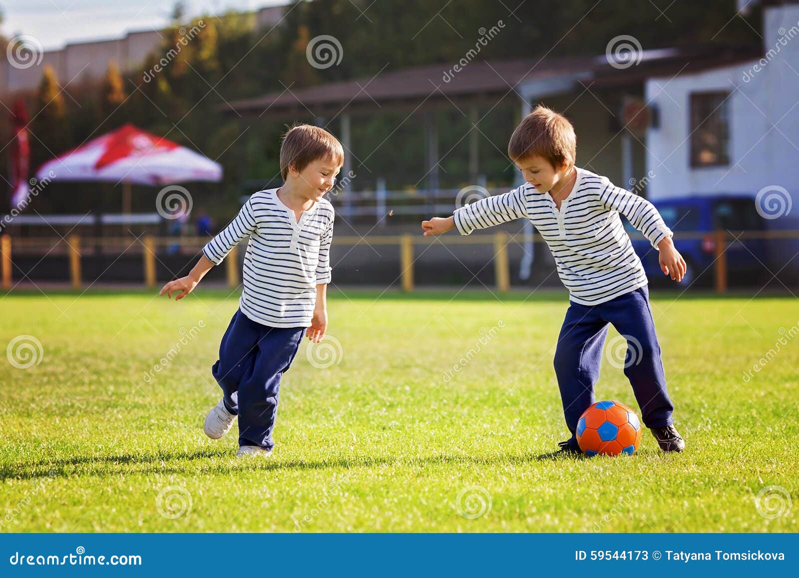 Two Cute Boys Playing Football Stock Illustration - Download Image Now -  Child, Boys, Playing - iStock