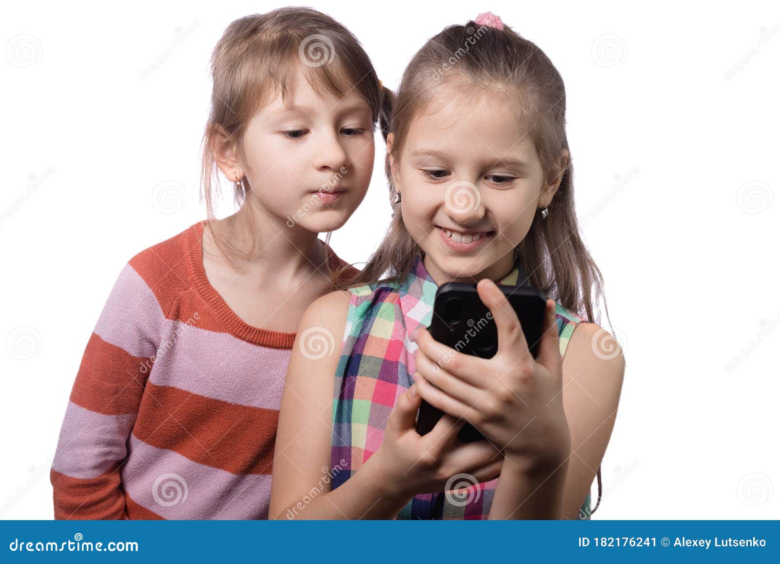 Two Cute Little Girls Posing with Mobile Phone Stock Image - Image of ...