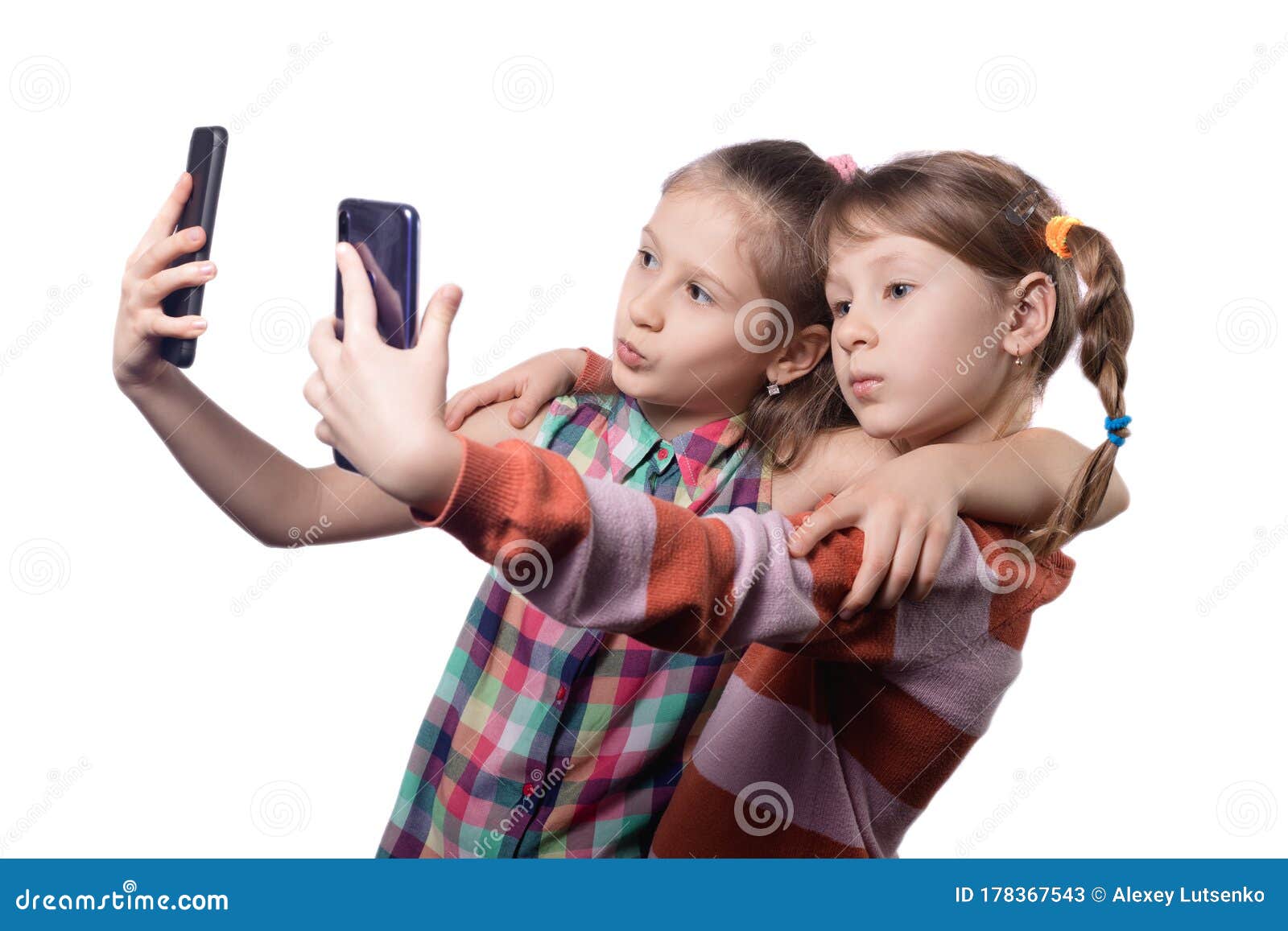 Two Cute Little Girls Posing with Mobile Phones Stock Image - Image of ...