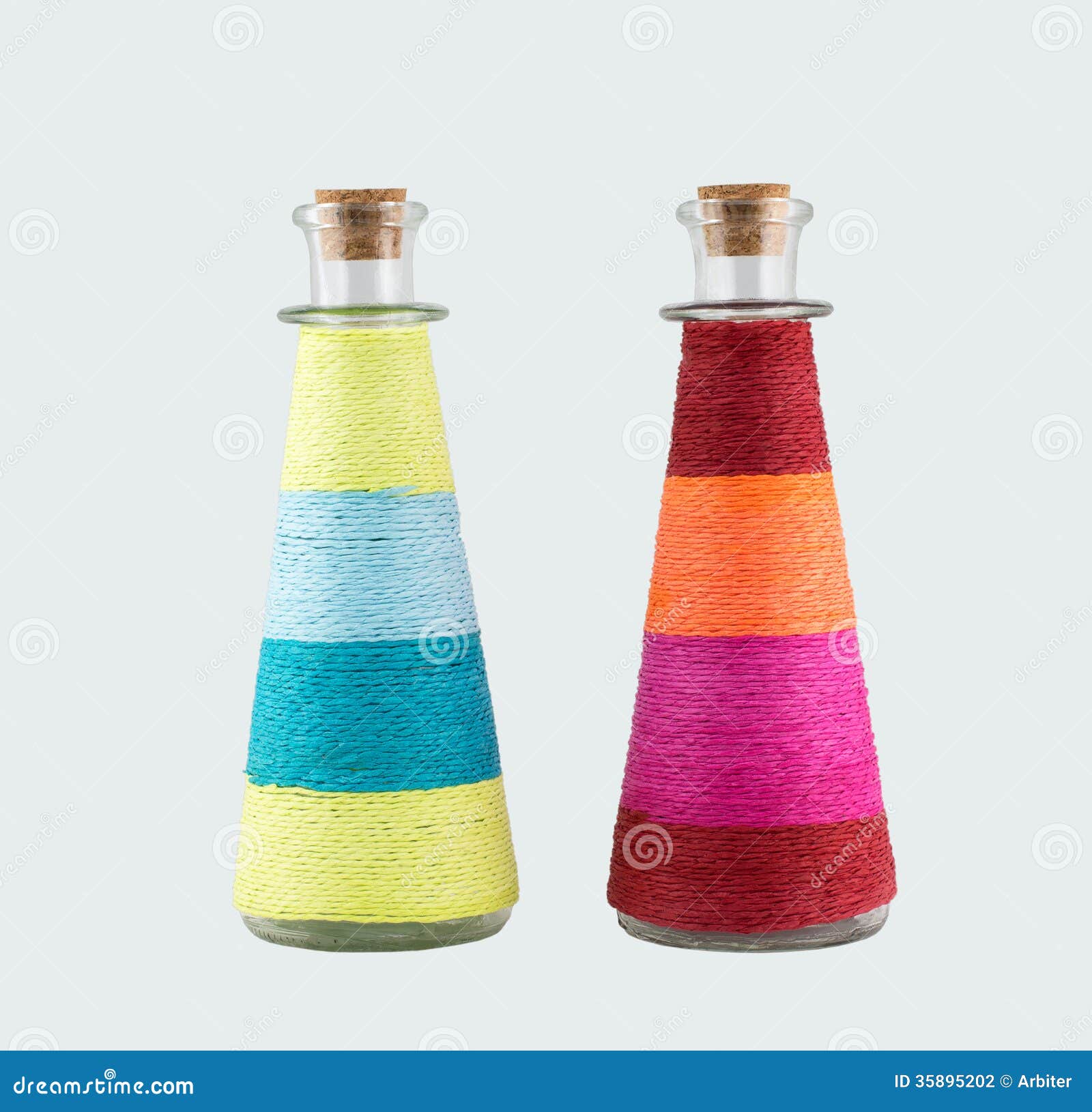 Two decorative bottles stock photo. Image of rope, glassware 35895202