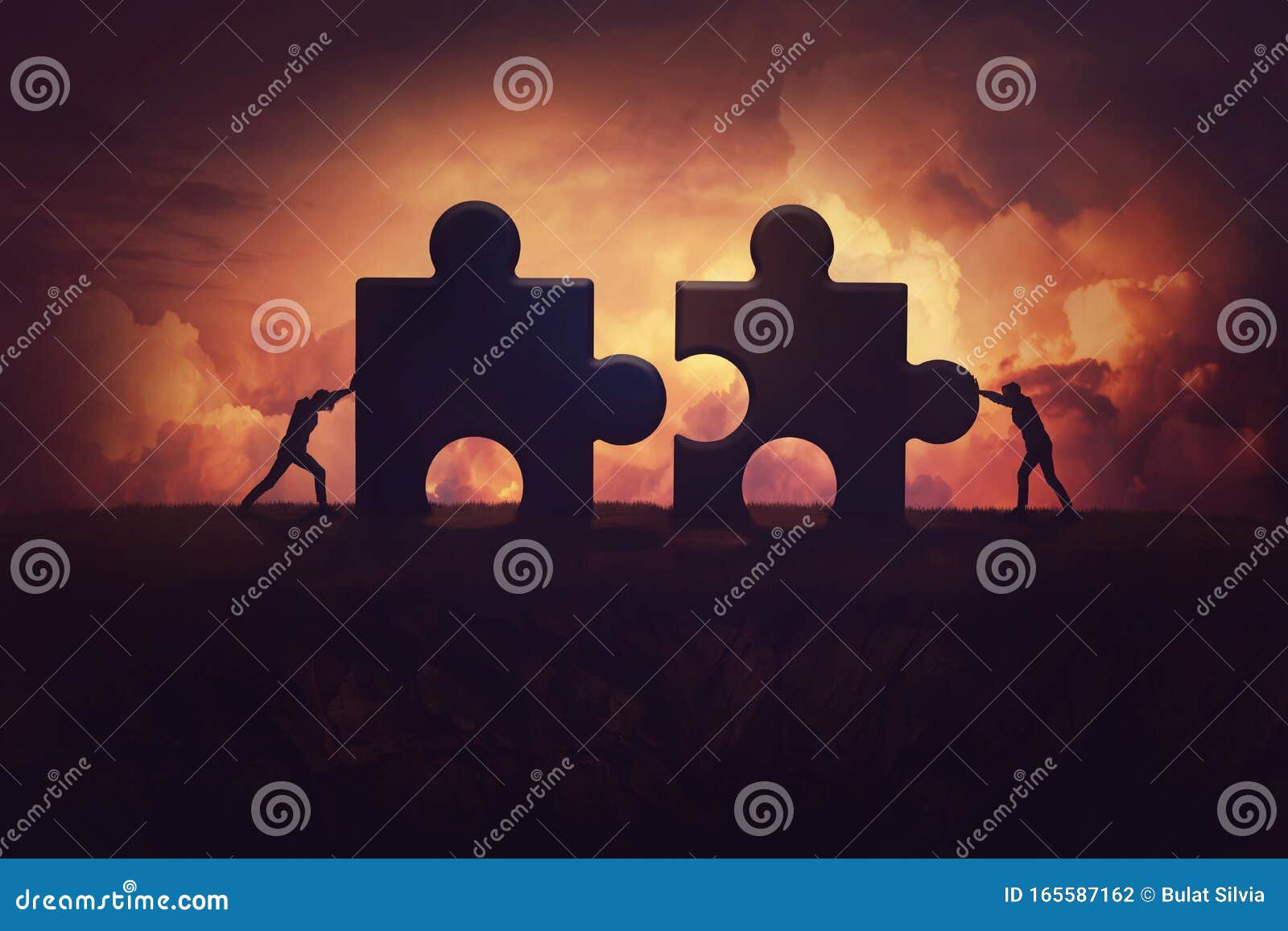 two determined businessman pushing big jigsaw puzzle pieces to unite and complete the purpose. business teamwork concept,
