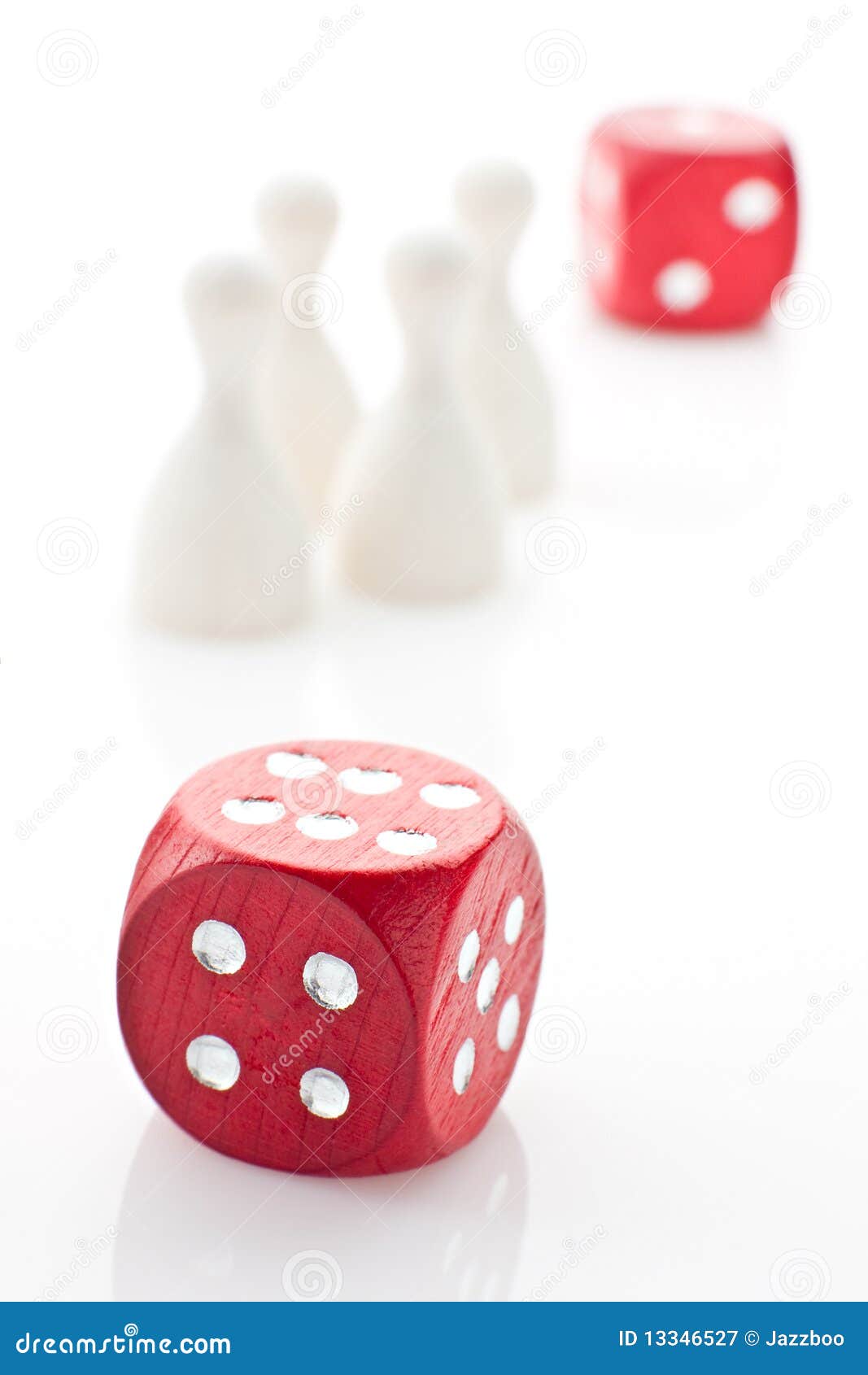Two dice and gaming pieces stock image. Image of crowd 13346527