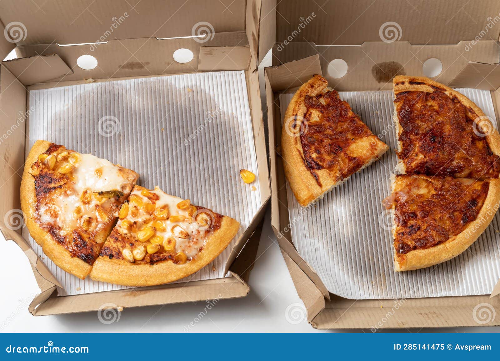 Two Different Pizza Slices in a Cardboard Box. Pizza Delivery. Top View