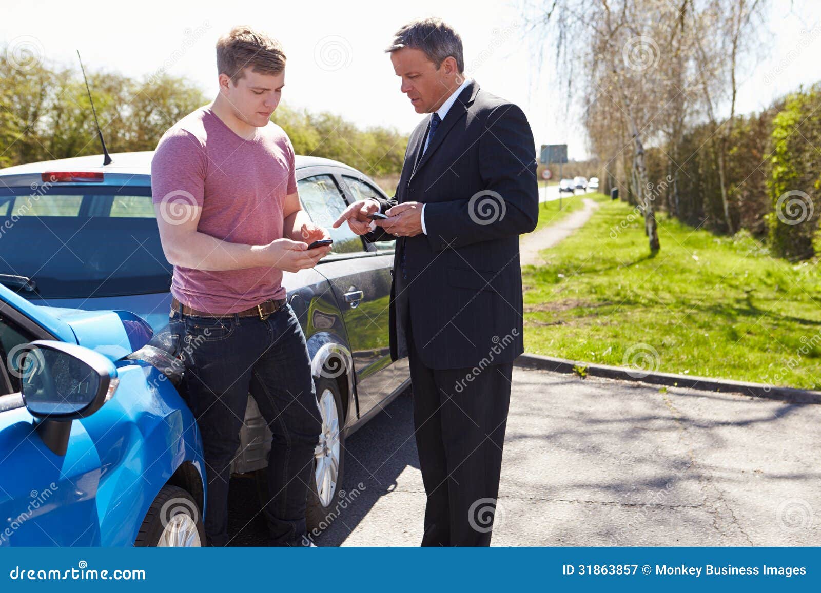 Two Drivers Exchange Insurance Details after Accident Stock Image