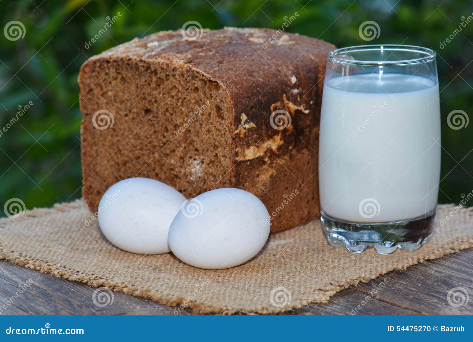 Two Eggs and Baked Cut Rye Bread, Glass with Milk Stock Photo Image