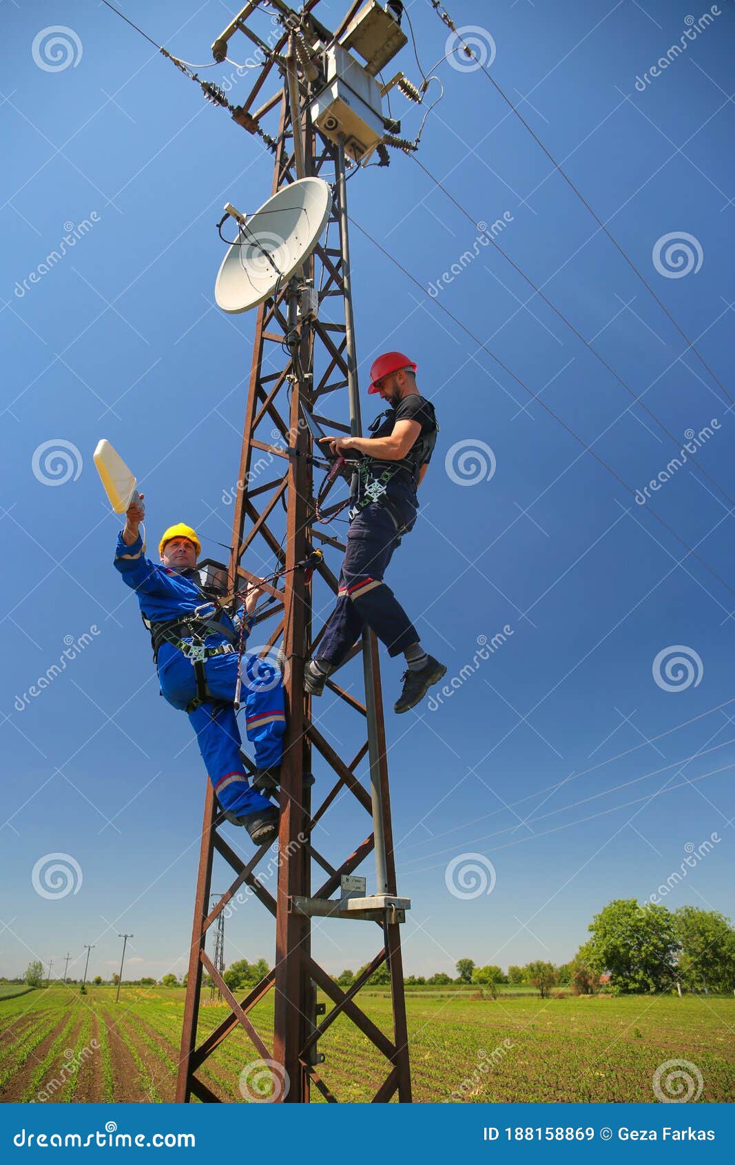 Two Electricians Install Antenna System Stock Image