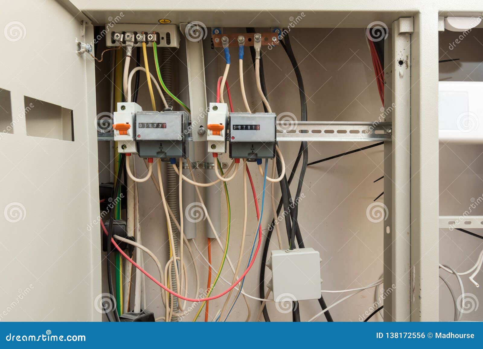 Two Electronic Electrical Meters and a Junction Box Stock Photo Image