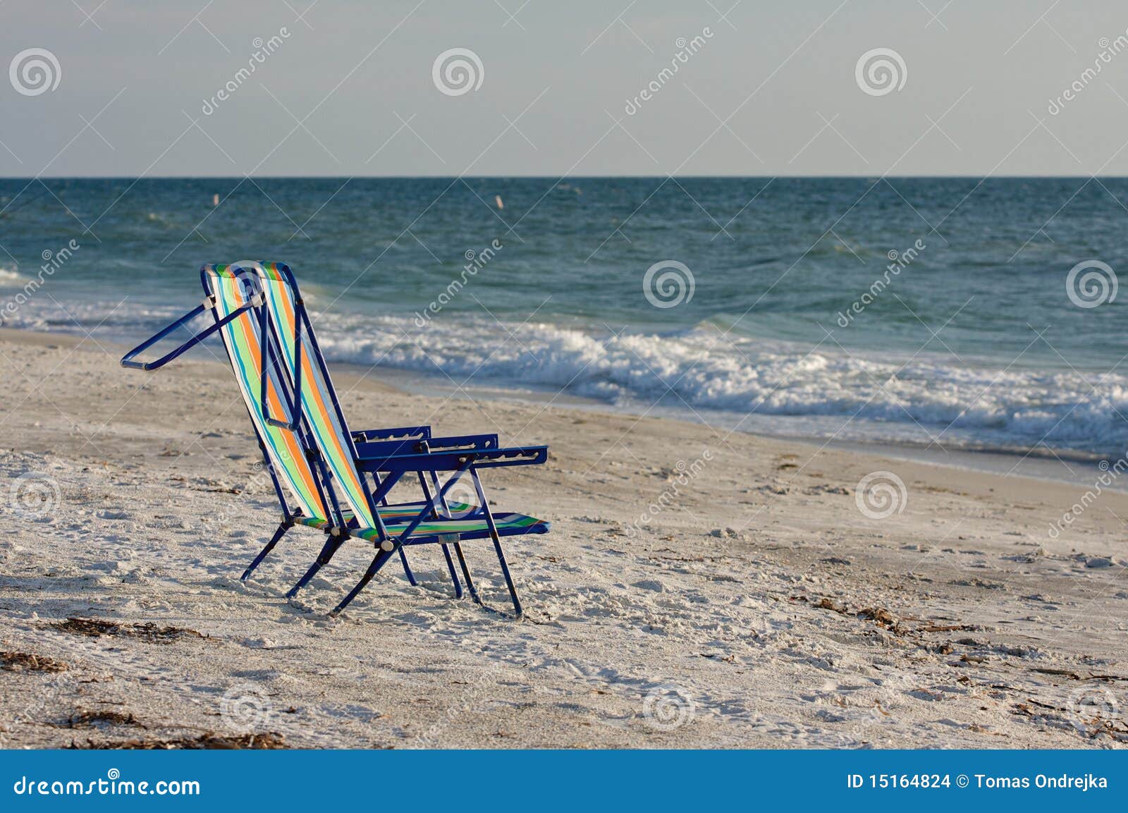 Two empty beach chairs. stock photo. Image of recreational 15164824