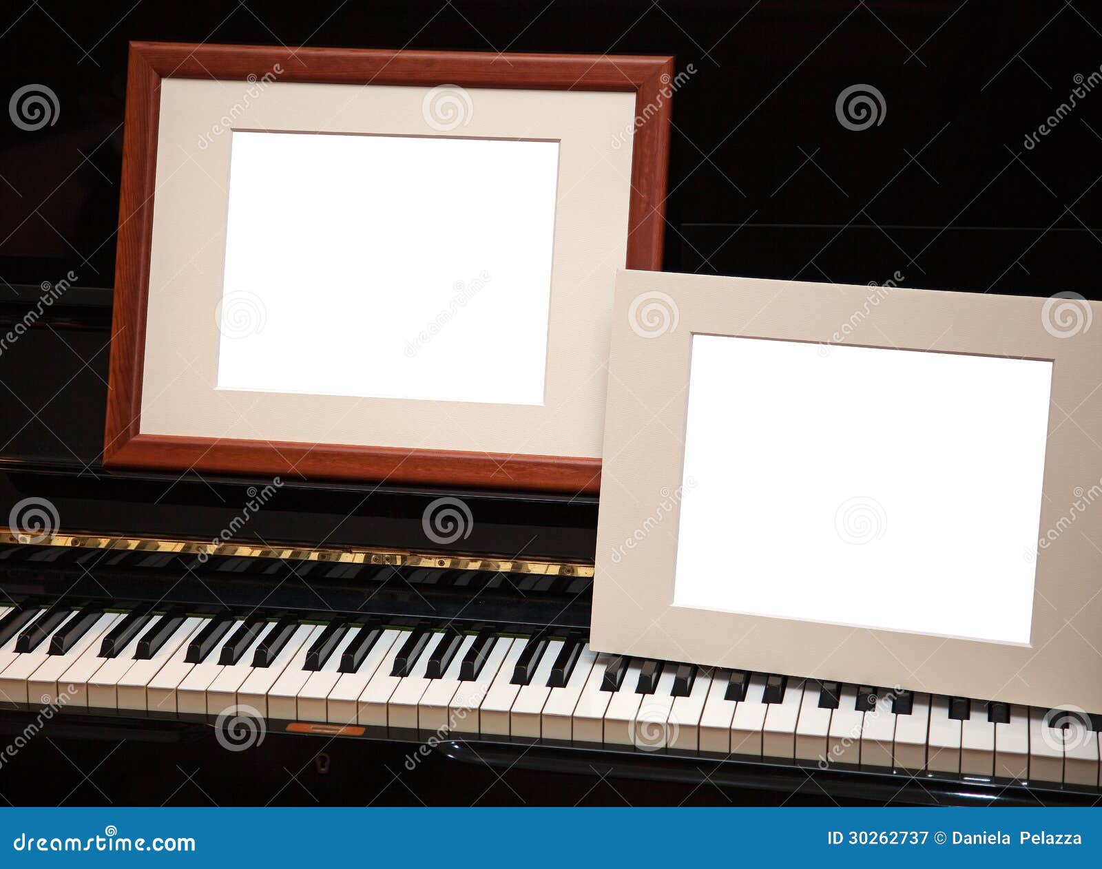 Two empty frames on piano stock image. Image of dark 30262737
