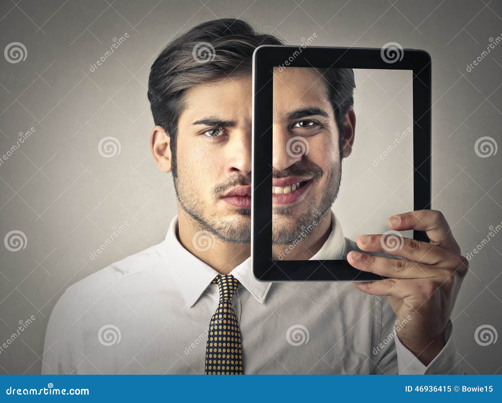 two-faces-businessman-holding-tablet-loo