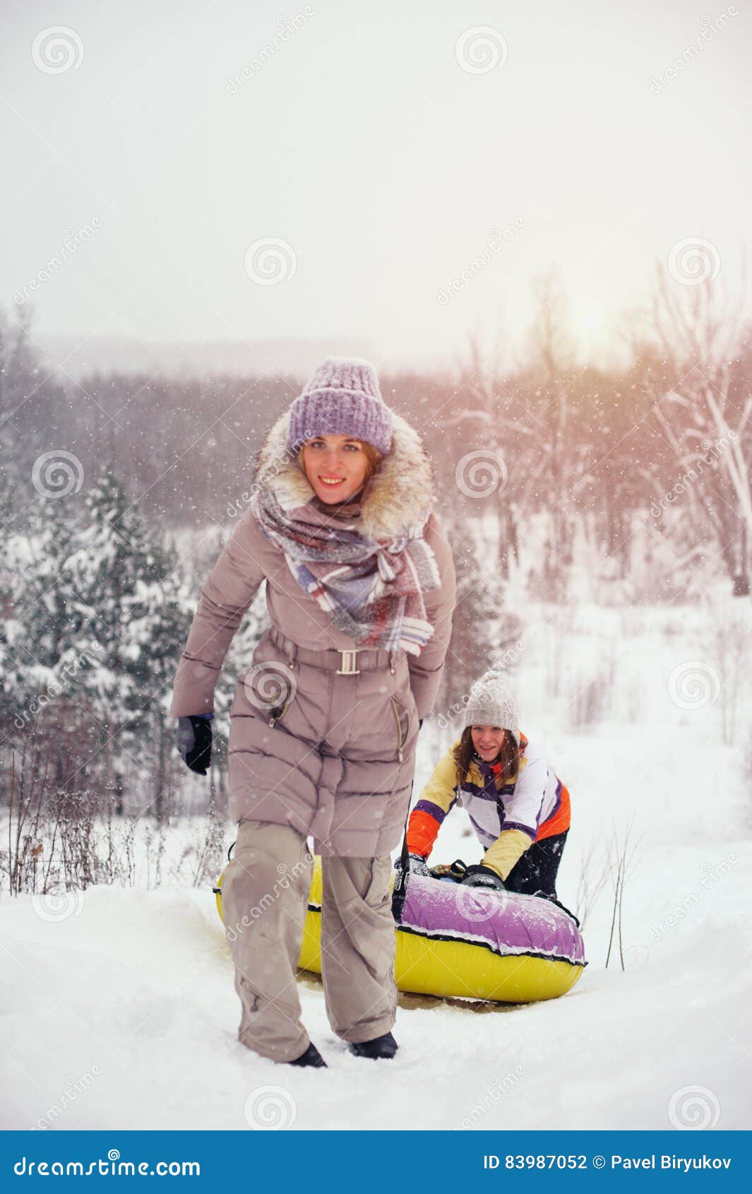 Two Female Friends Having Fun On Snow Hill Stock Photo Image Of