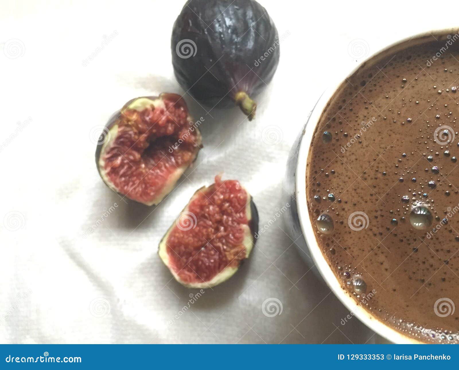 A Pulp of Fresh Figs and Mug of Coffee on a White Tissue Stock Image