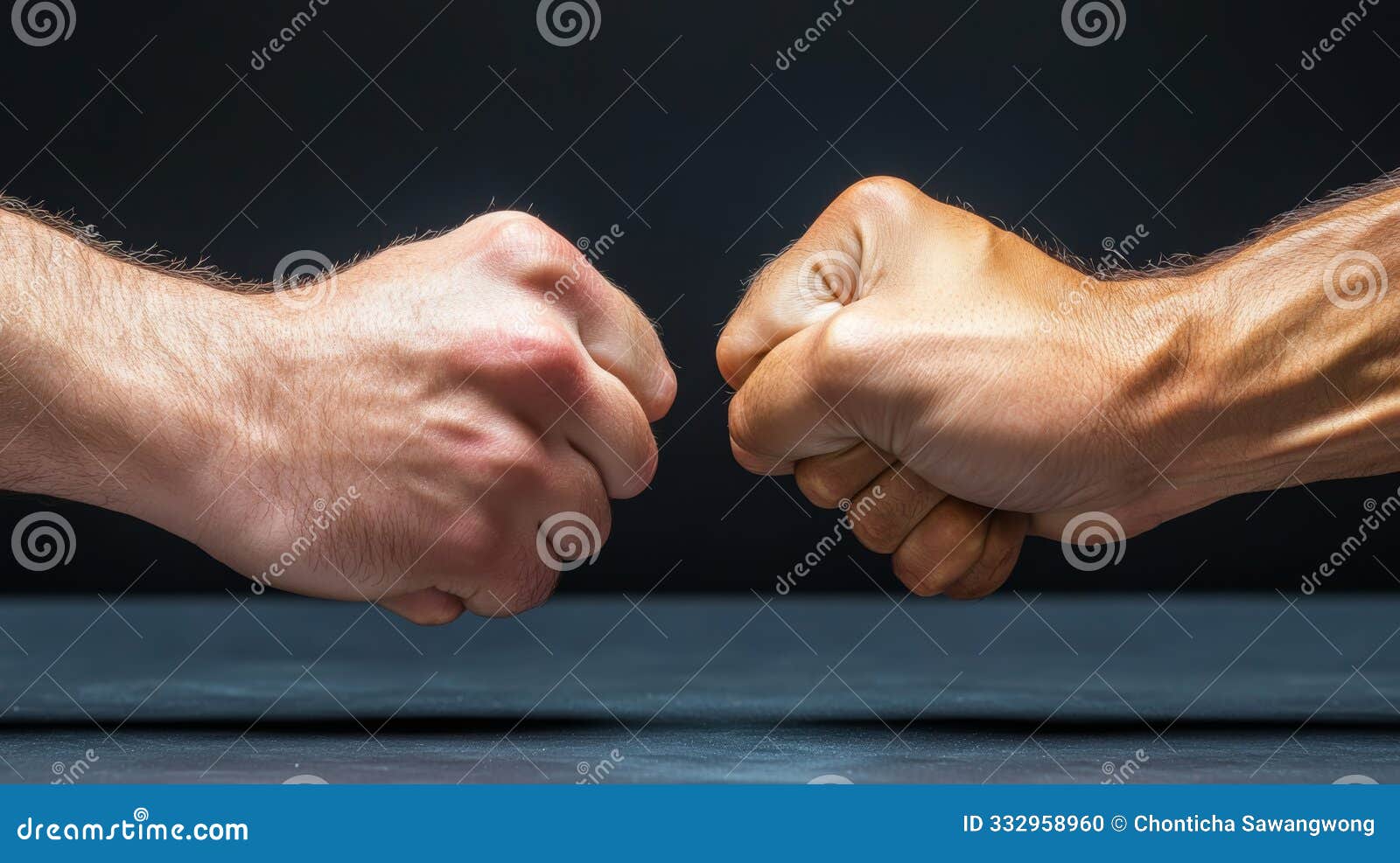 two fists clashing together in a  of strength, determination, or competition against a dark background