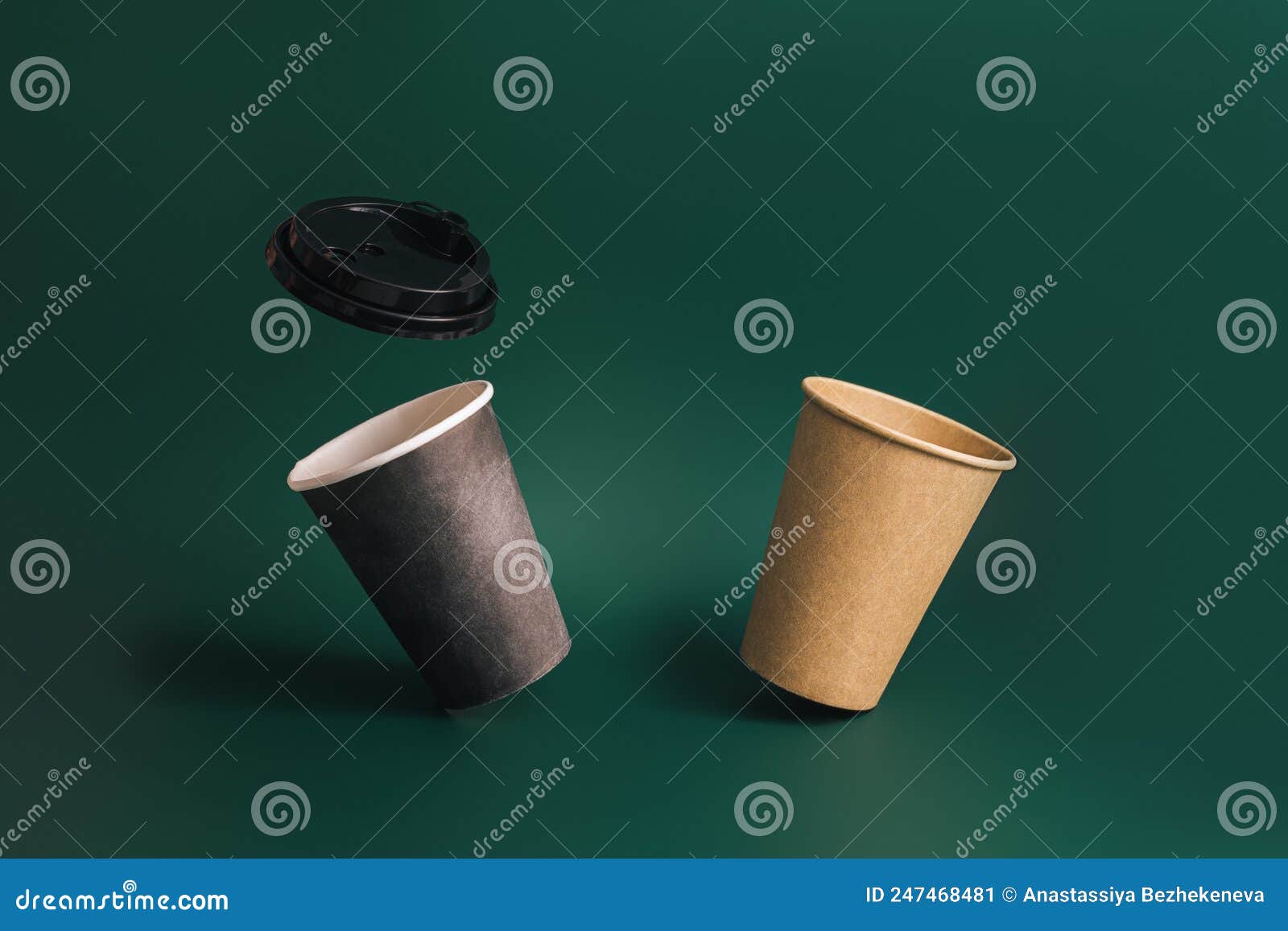 Two Floating Disposable Cups and Lid Against Green Background Stock Image Image of drink
