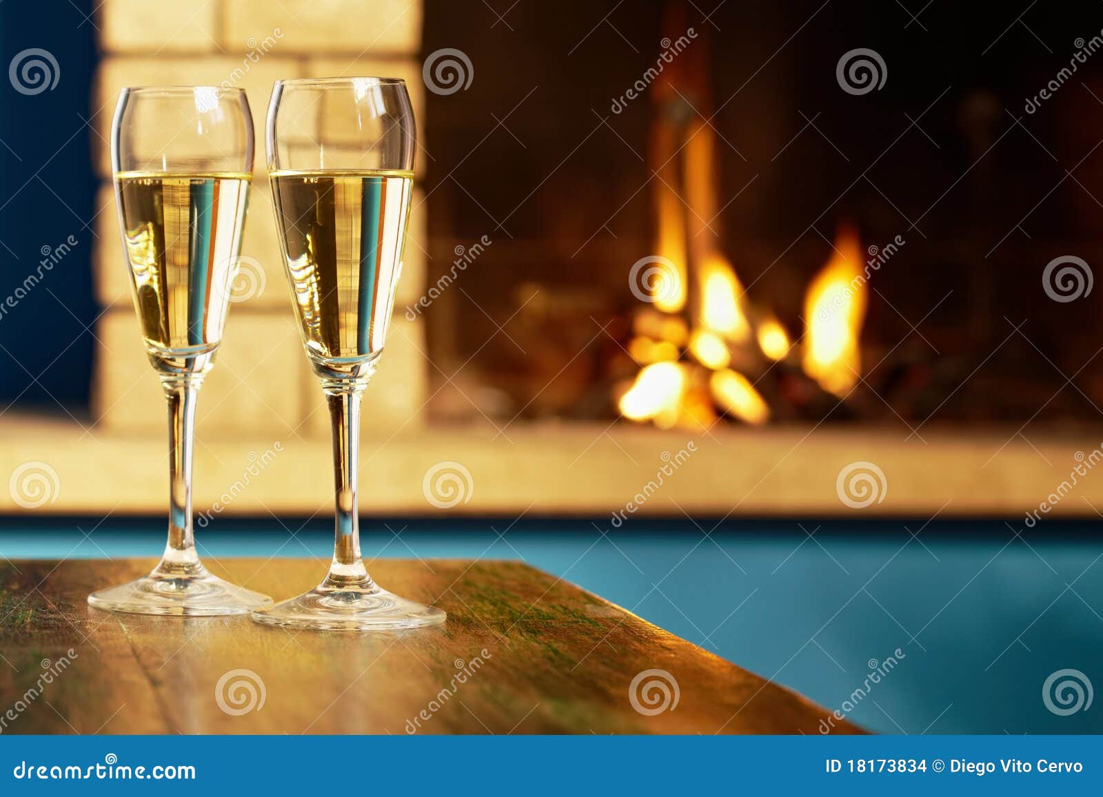 Two Flutes Filled with Champagne Near Fireplace Stock Photo Image of festive, alcohol 18173834
