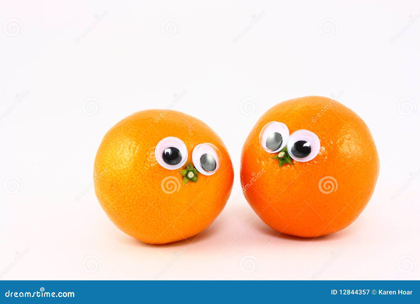 Two Fresh Fruits with Wiggly Eyes Stock Image Image of foods, face 12844357