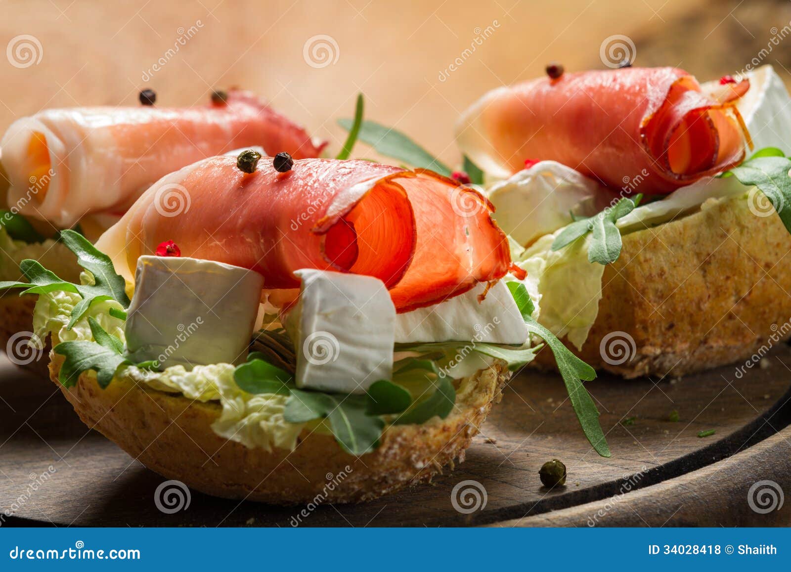 Two Fresh Sandwiches Made of Parma Ham and Brie Cheese Stock Photo