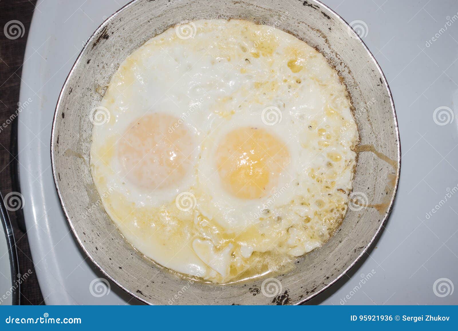 Two Fried Eggs in a Small Frying Pan Stock Photo Image of stove